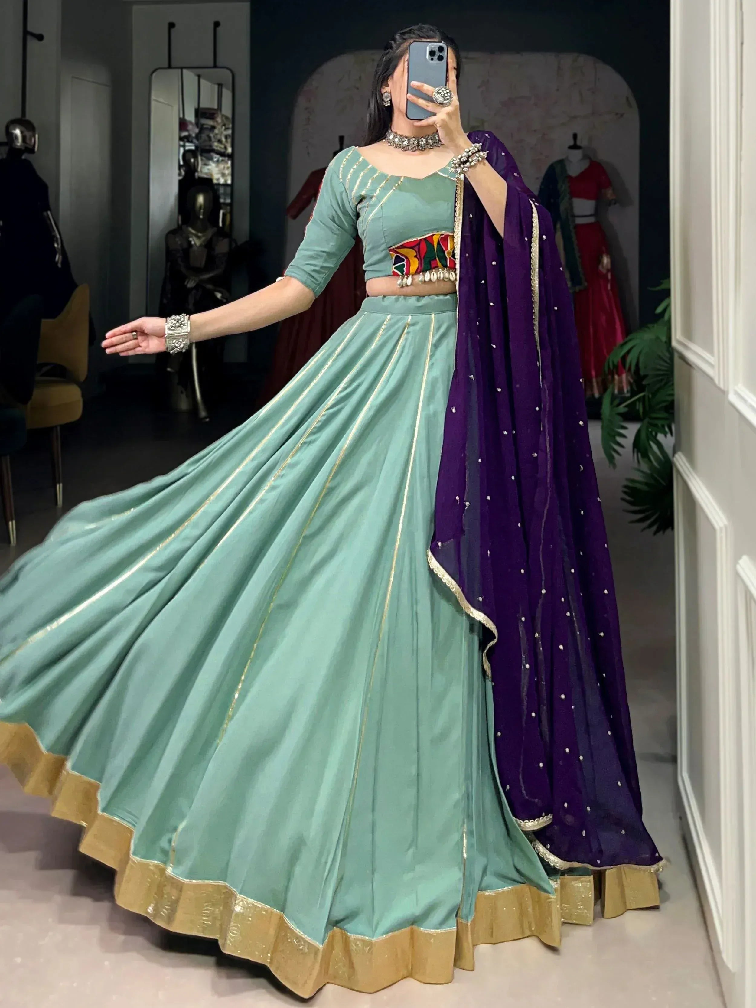 Mint green lehenga choli with gold trim and purple dupatta, Indian ethnic wear for women