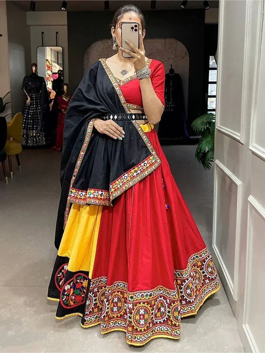 Red and black embroidered lehenga choli with yellow accents, perfect for Indian ethnic wear occasions