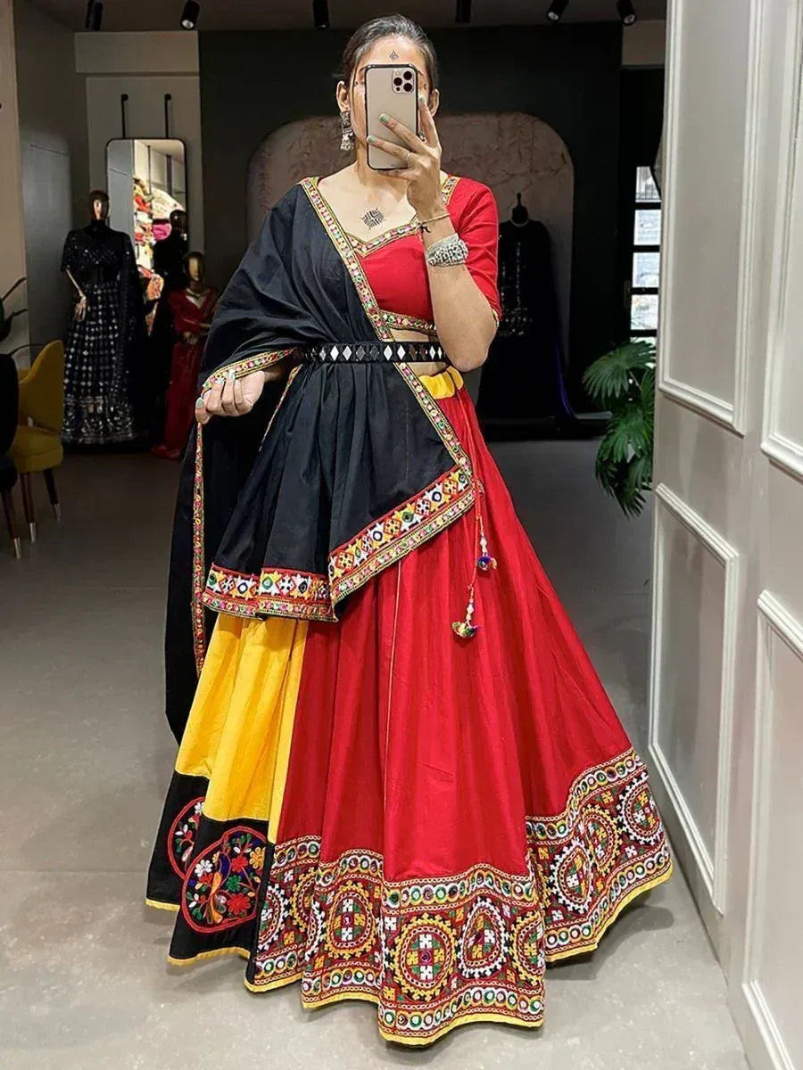 Red and black embroidered lehenga choli with yellow accents, traditional Indian ethnic wear