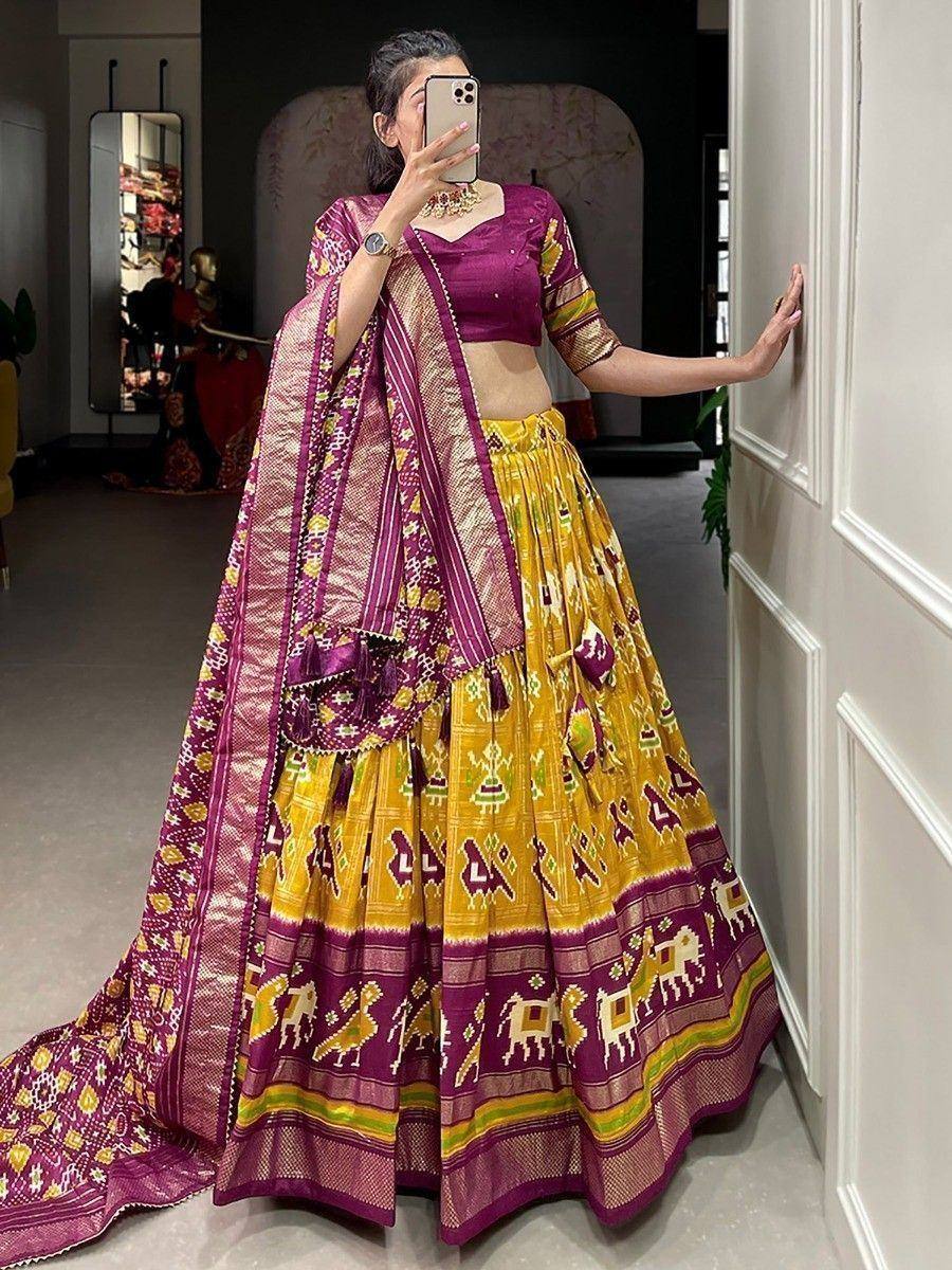 Yellow and purple Ikat print lehenga choli with matching dupatta, ethnic Indian wear for women