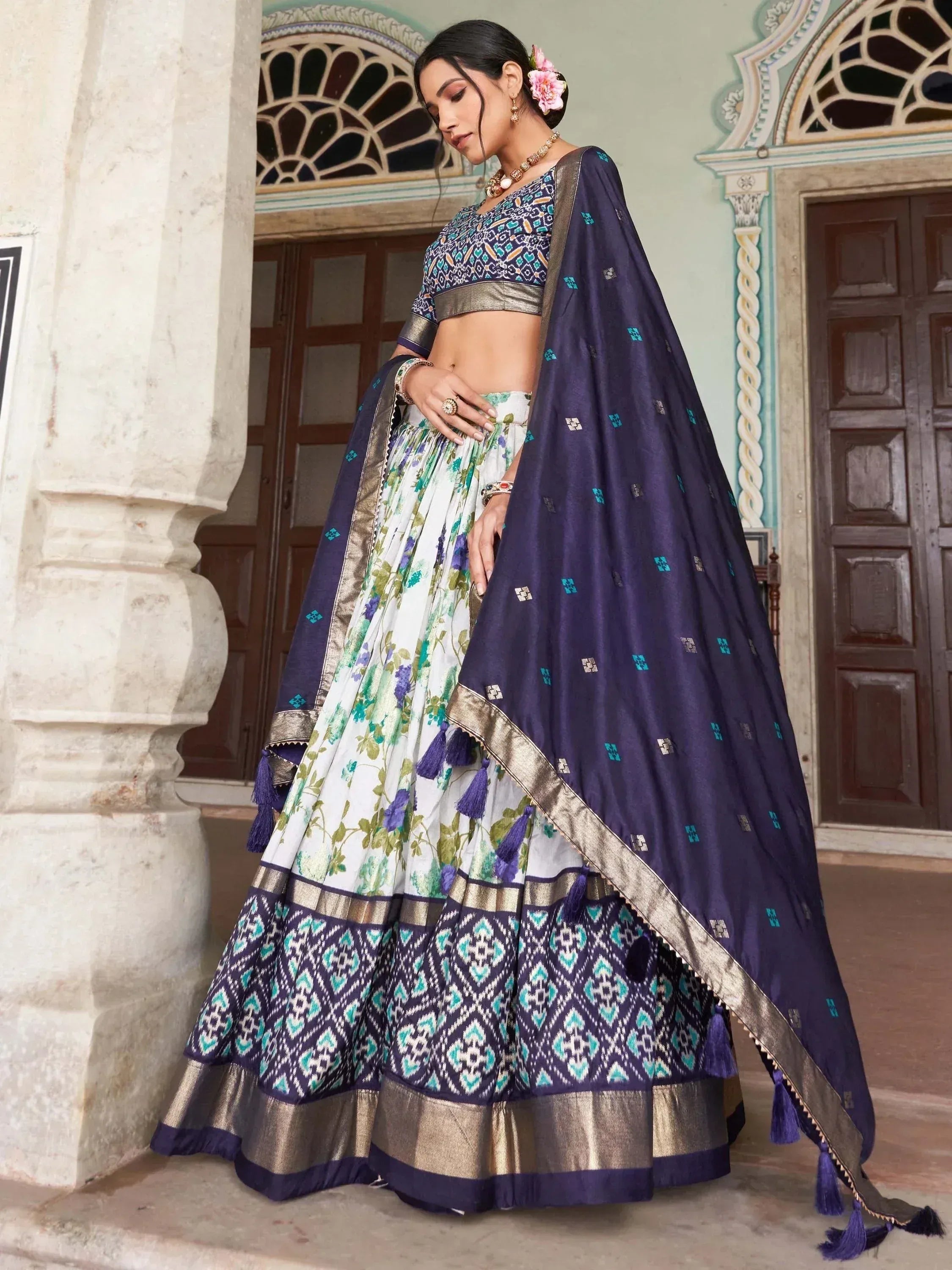 Elegant floral lehenga choli with navy dupatta, perfect for Indian ethnic wear occasions