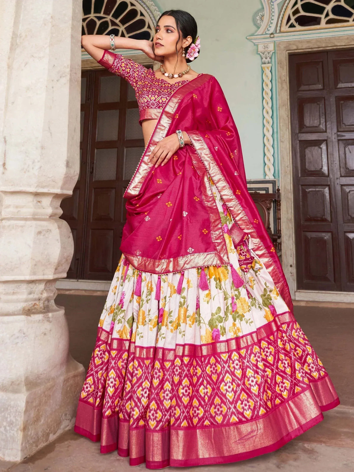 Pink floral lehenga choli with gold border, ethnic Indian wear for weddings and festivals