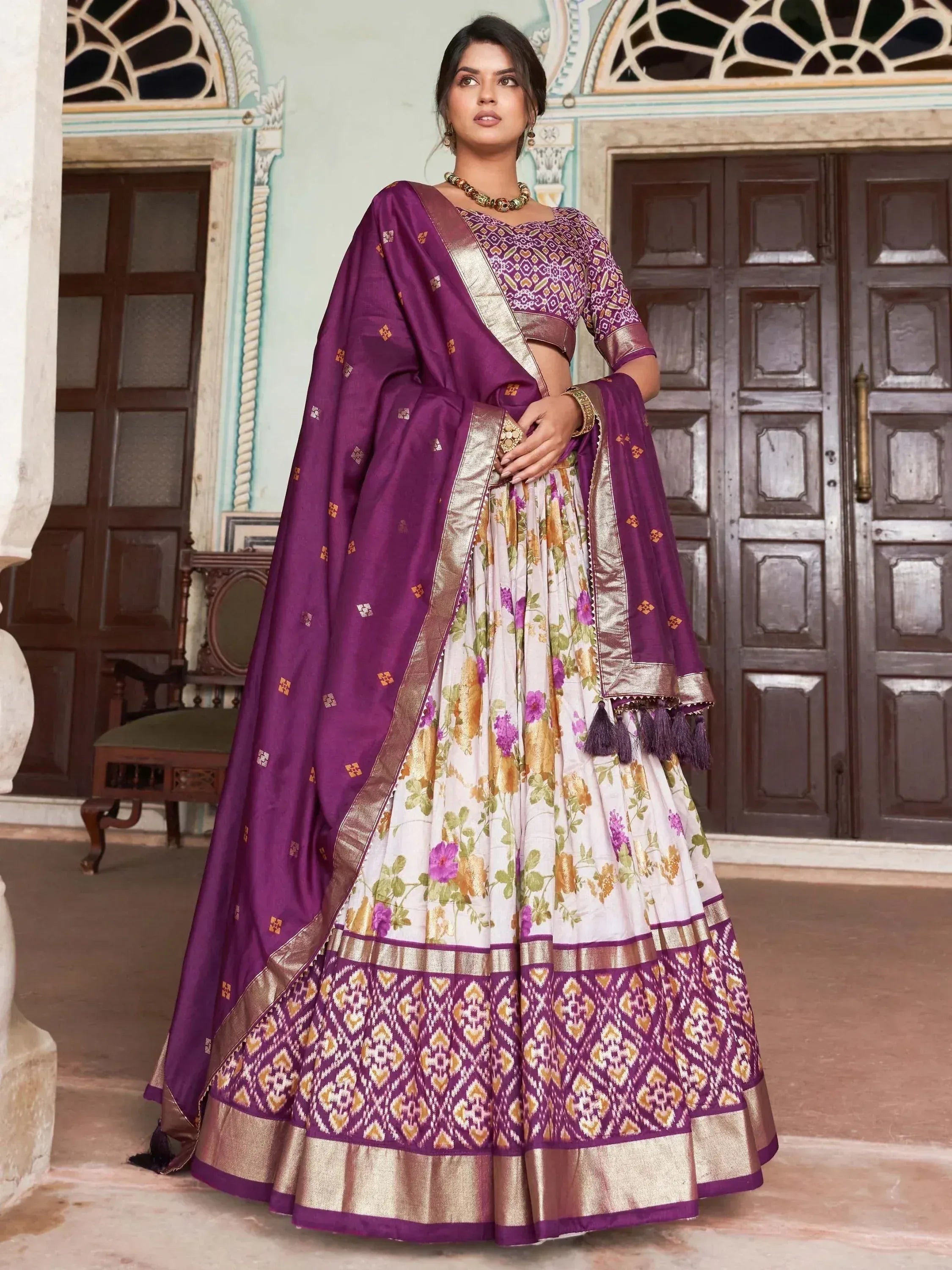 Purple and white floral lehenga choli with gold border, ethnic Indian wear for weddings and festivals