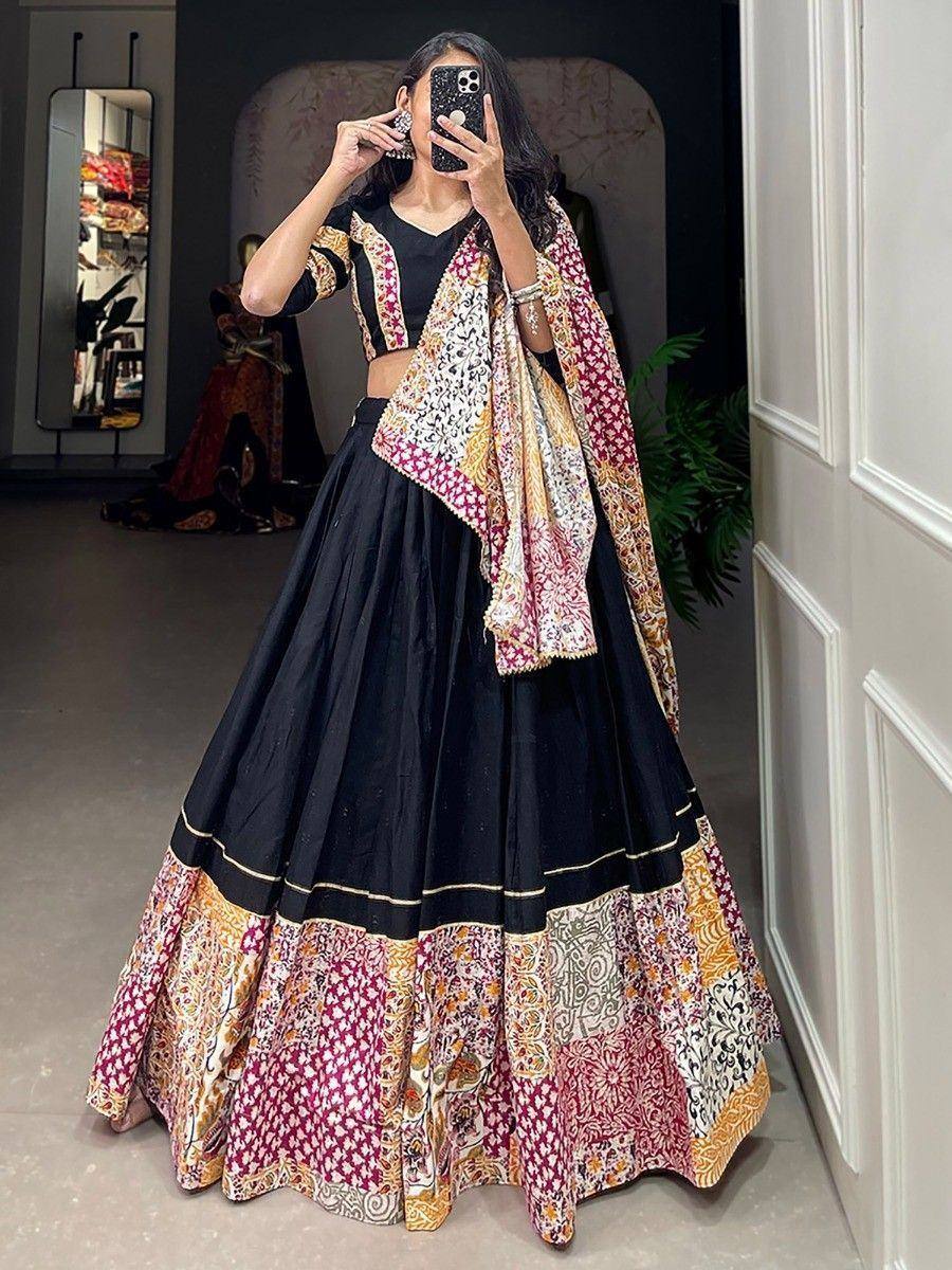 Black lehenga choli with printed border and matching dupatta, ethnic Indian wear for women