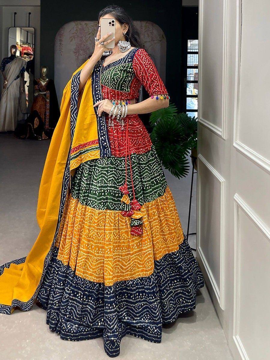 Colorful Indian lehenga choli with block print patterns and yellow dupatta, perfect for festive occasions
