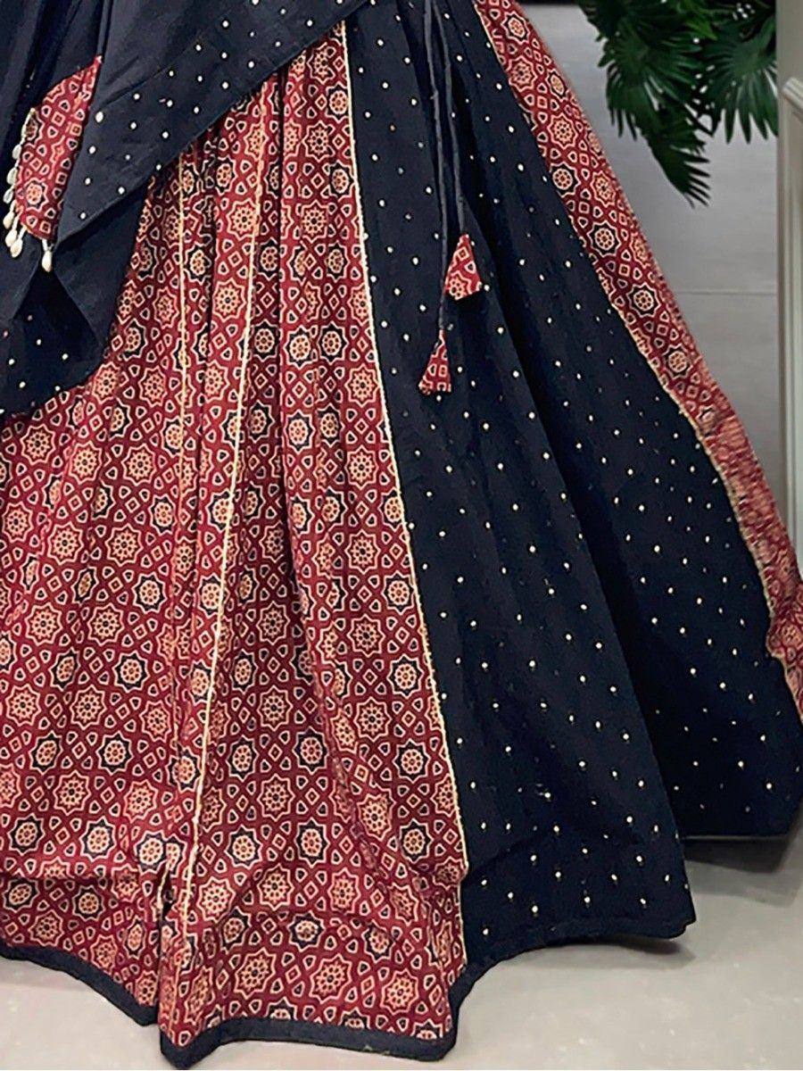 Red and navy blue printed lehenga choli with geometric patterns and polka dots, ethnic Indian wear