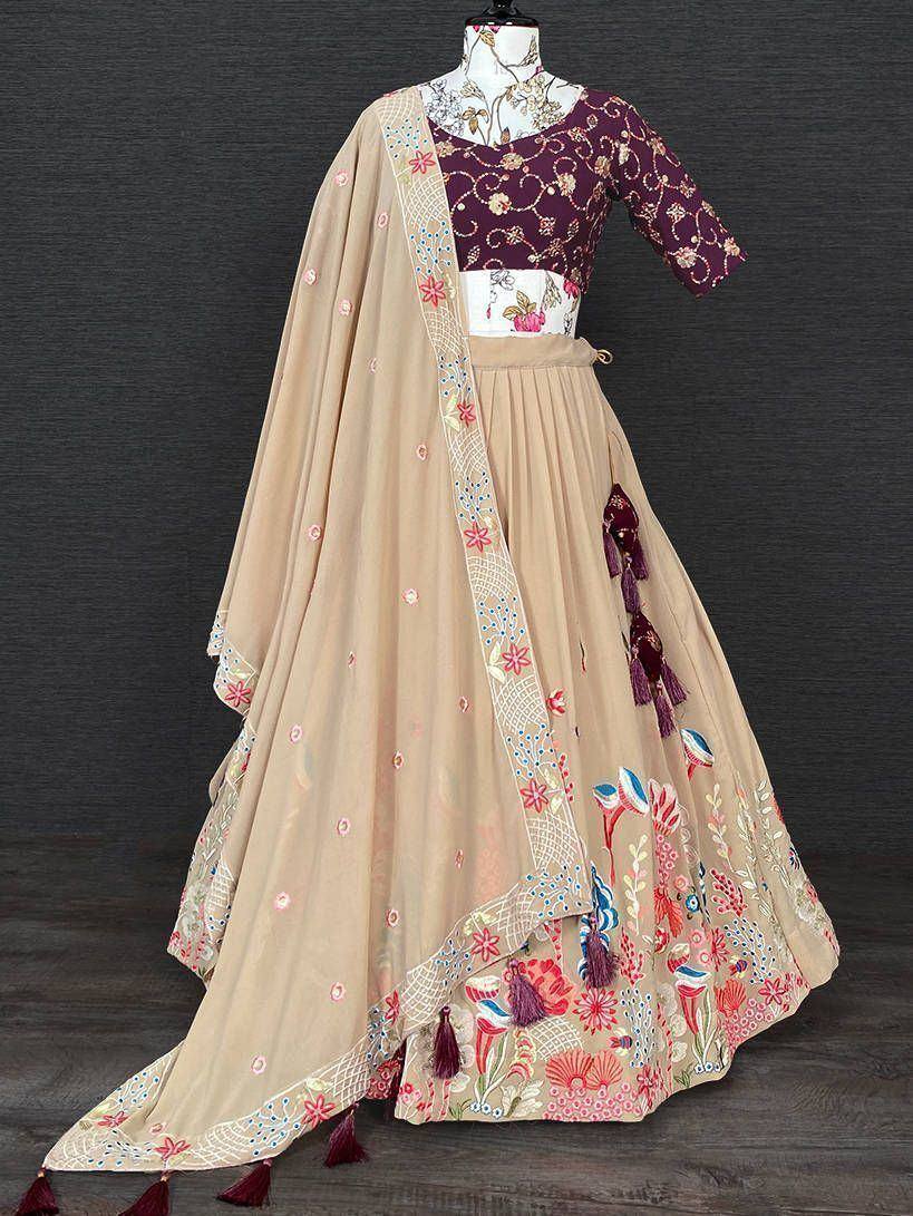 Beige floral embroidered lehenga choli with maroon blouse and dupatta, perfect for Indian ethnic occasions