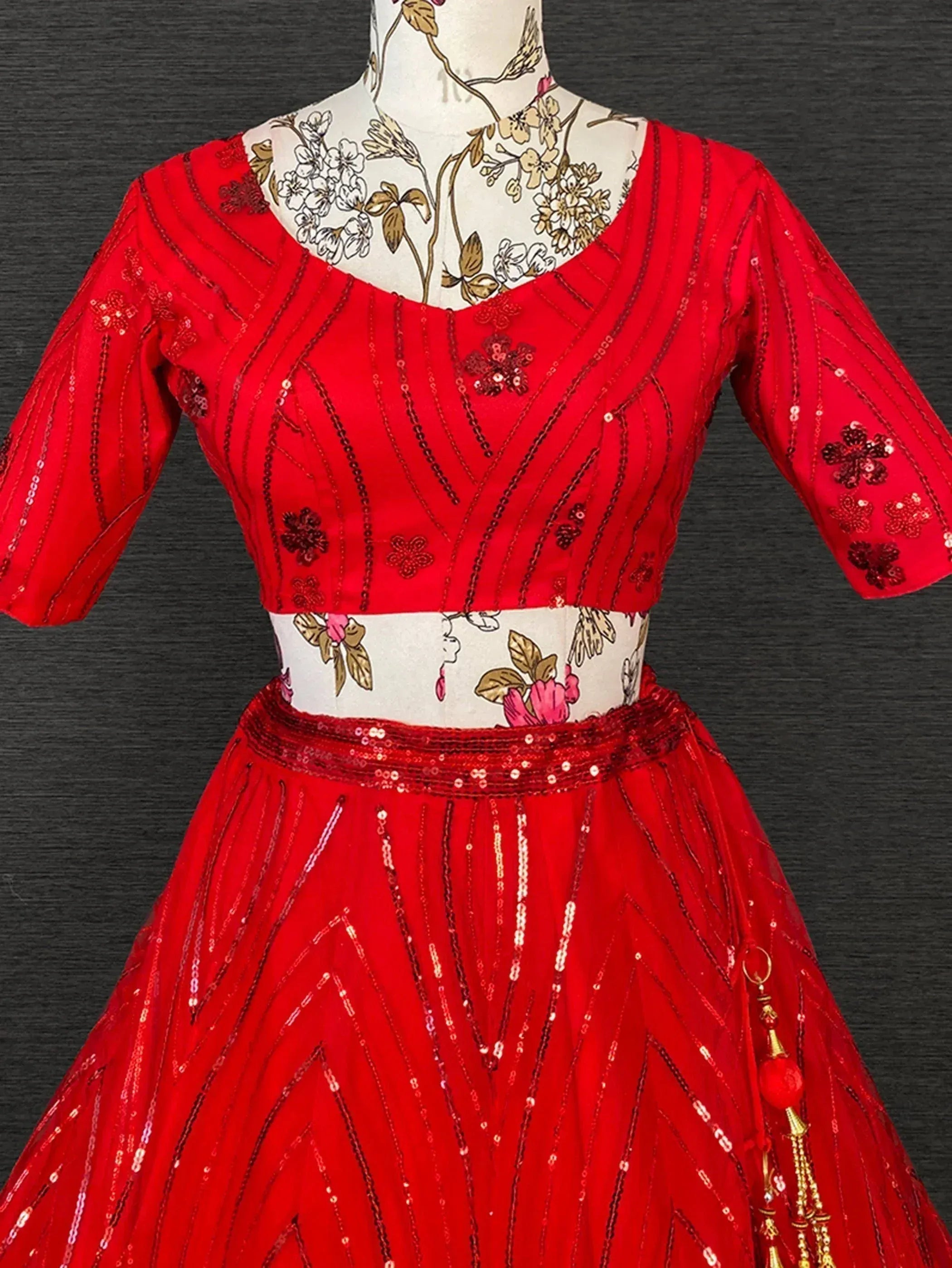 Red sequin lehenga choli with floral embroidery, perfect for Indian ethnic wear and festive occasions