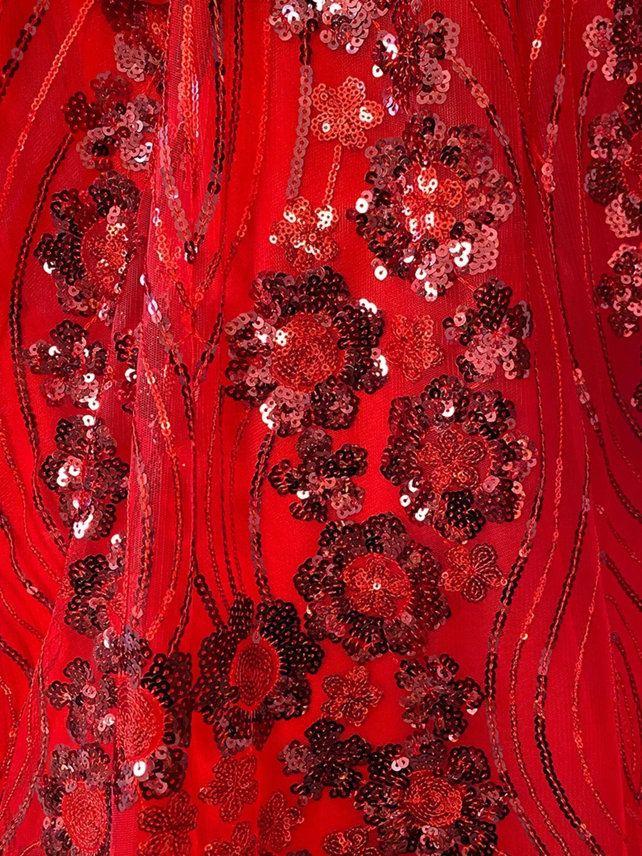 Red ethnic gown with intricate sequin floral embroidery and sheer overlay