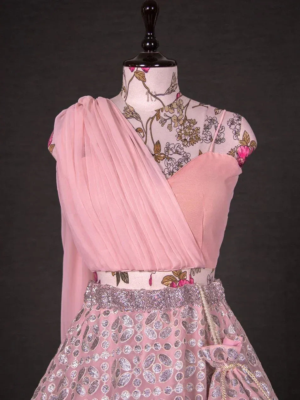 Pink floral print lehenga choli with pleated dupatta and silver embellished skirt