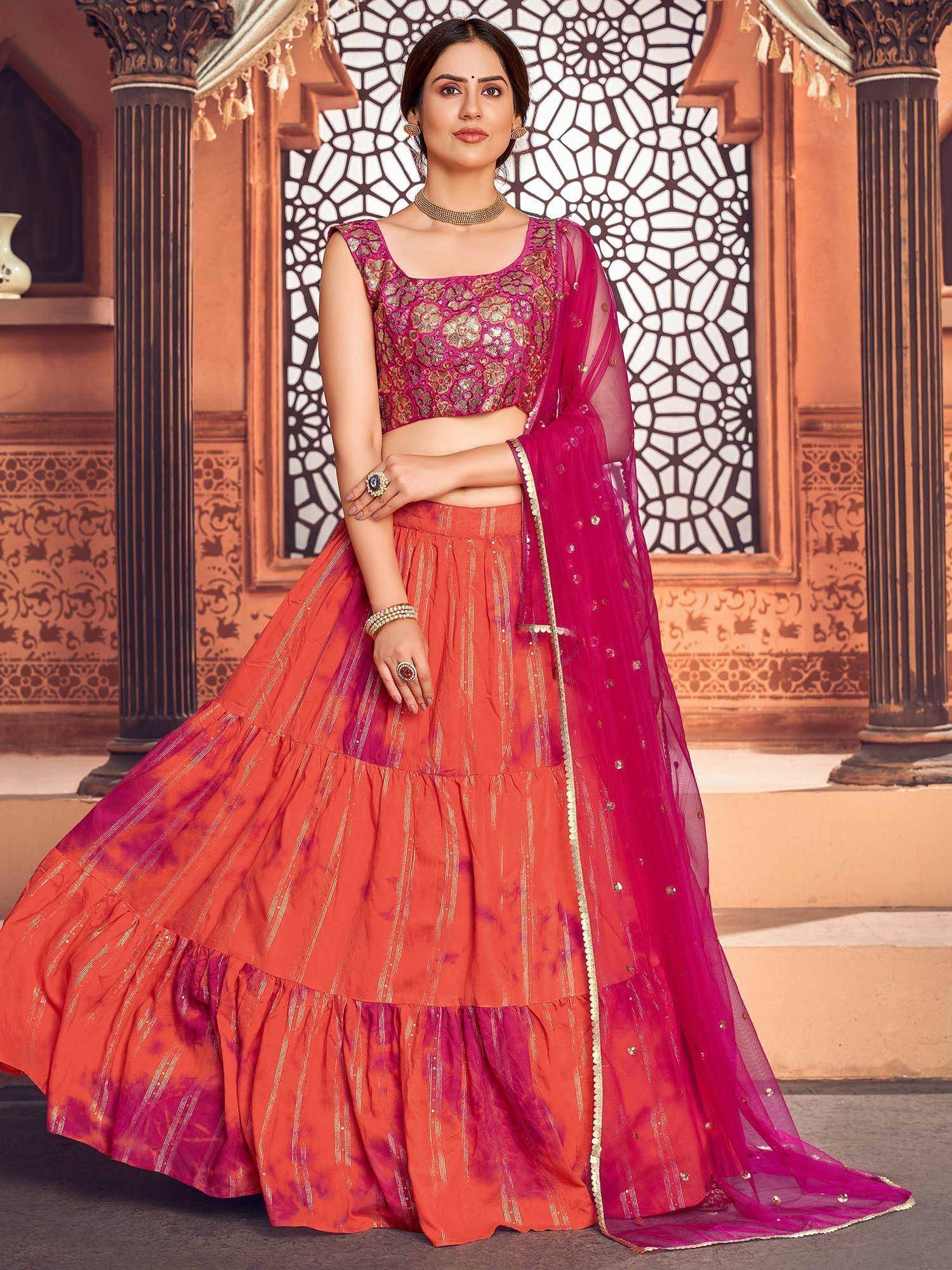 Pink and orange designer lehenga choli with gold embroidery, perfect for Indian ethnic wear occasions