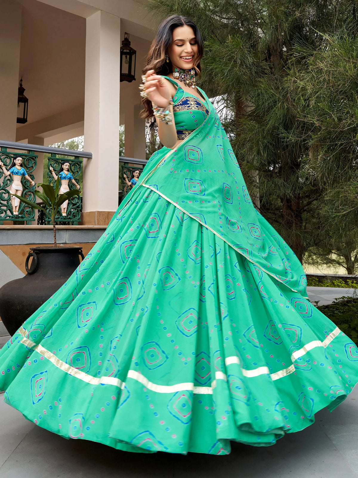 Chic Aqua Green Bandhej Printed Navratri Wear Lehenga Choli With Dupatta