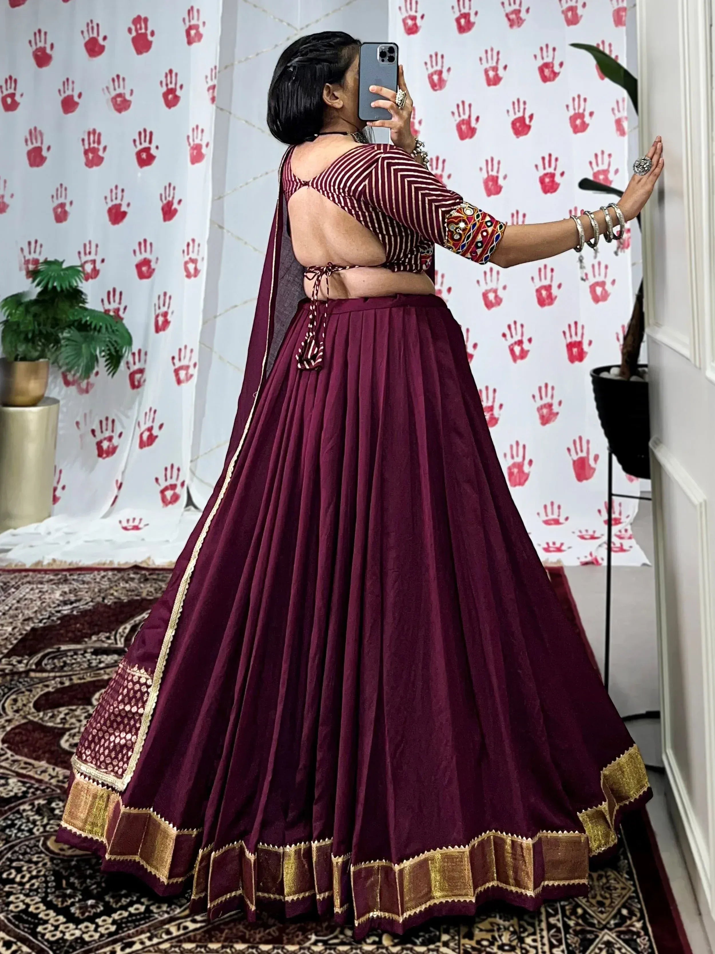 Maroon lehenga choli with backless blouse and gold border, ethnic Indian wear for women