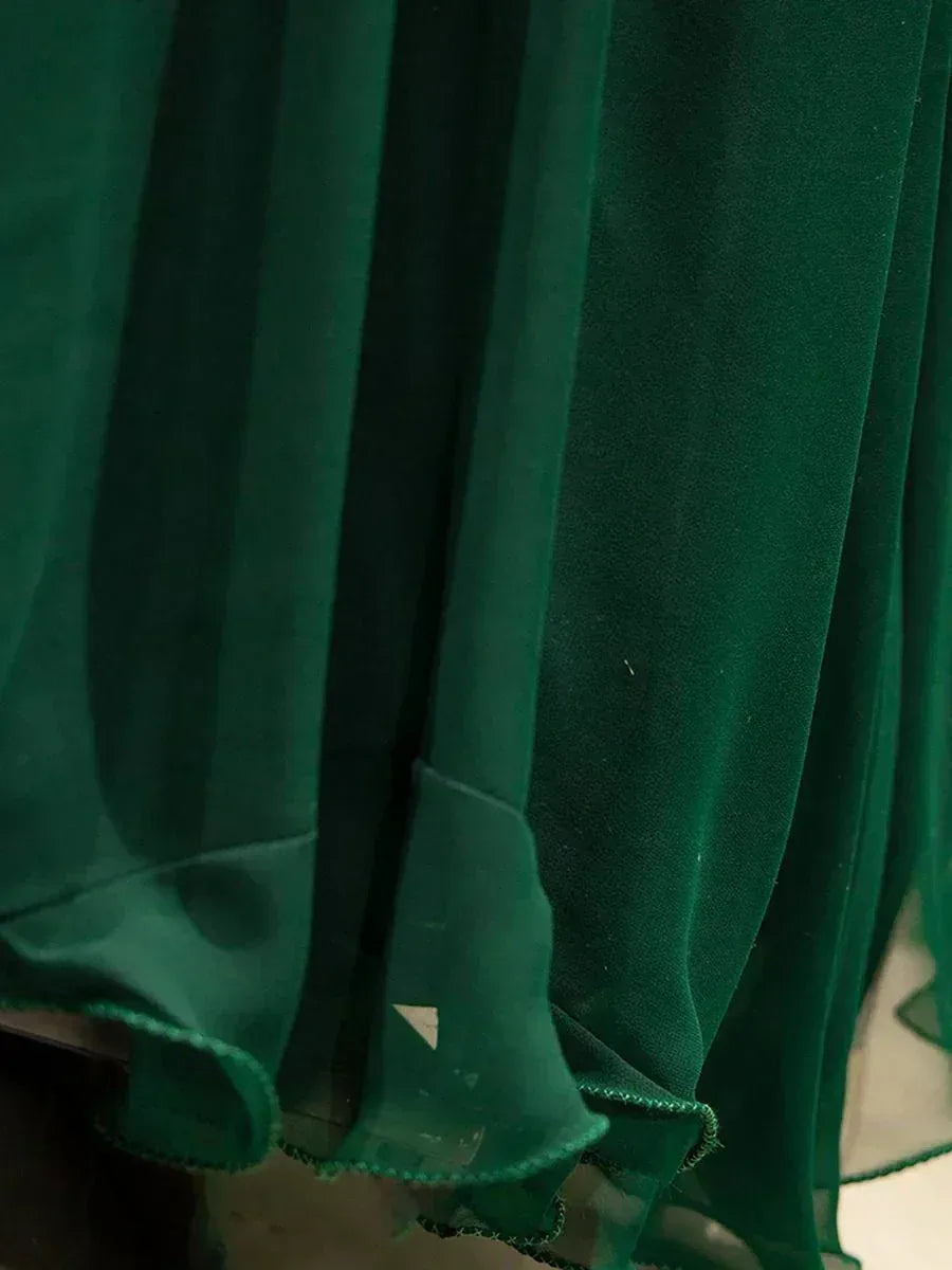 Emerald green pleated ethnic gown fabric with delicate hem detailing