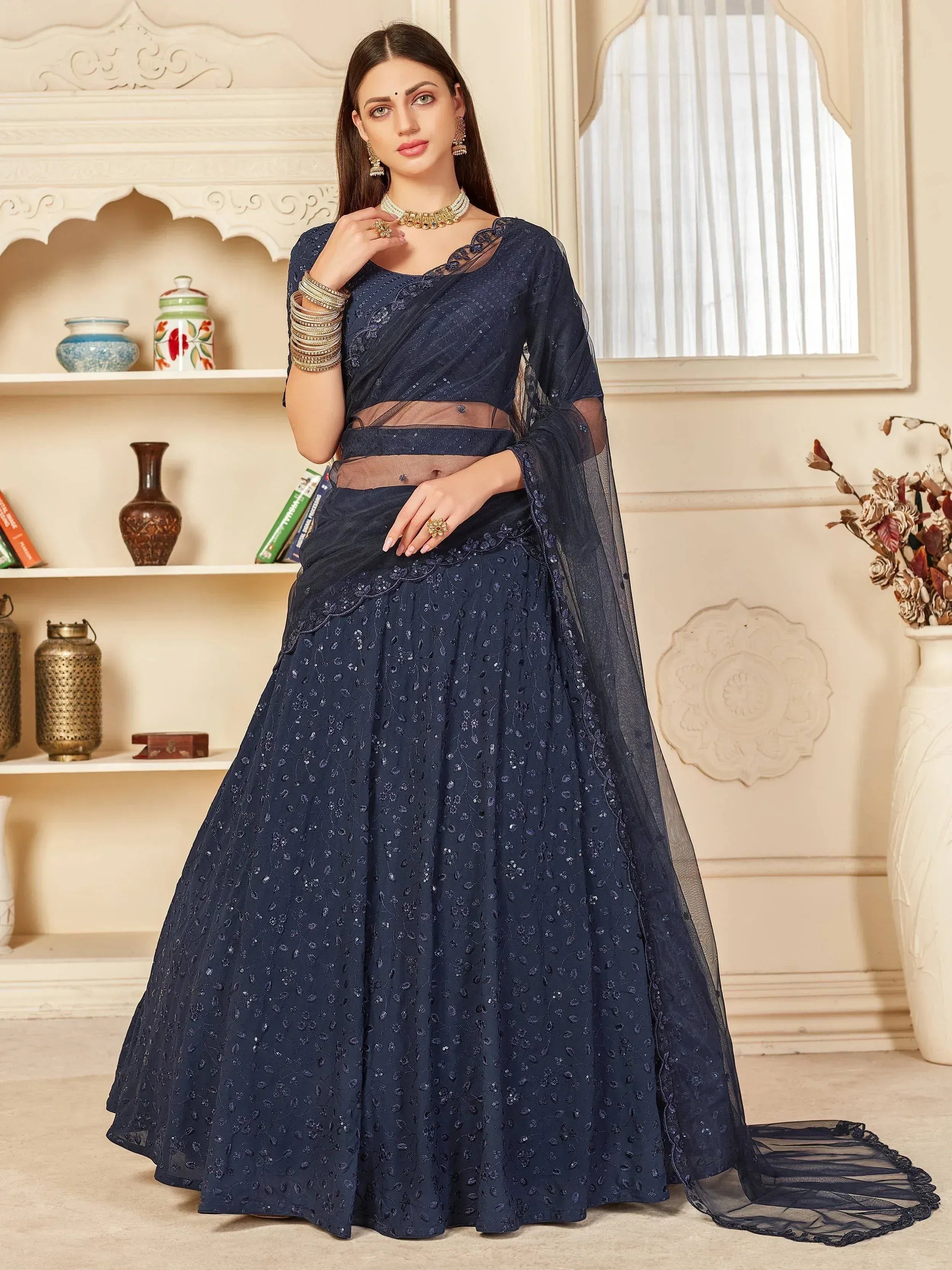 Navy blue sequined lehenga choli with sheer dupatta, ethnic Indian wear for weddings and parties