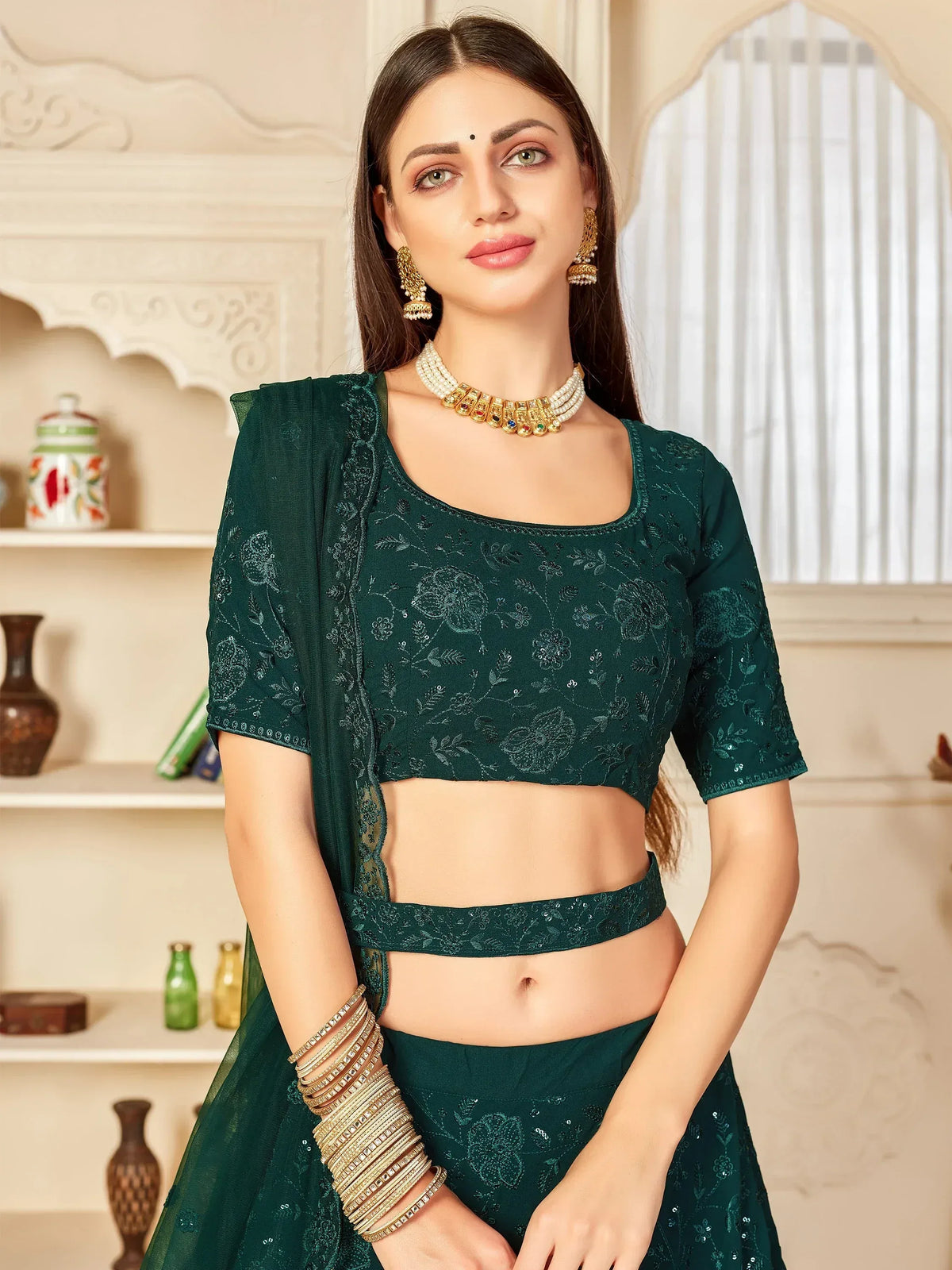 Emerald green embroidered lehenga choli with floral sequin work, perfect for Indian ethnic wear and festive occasions.