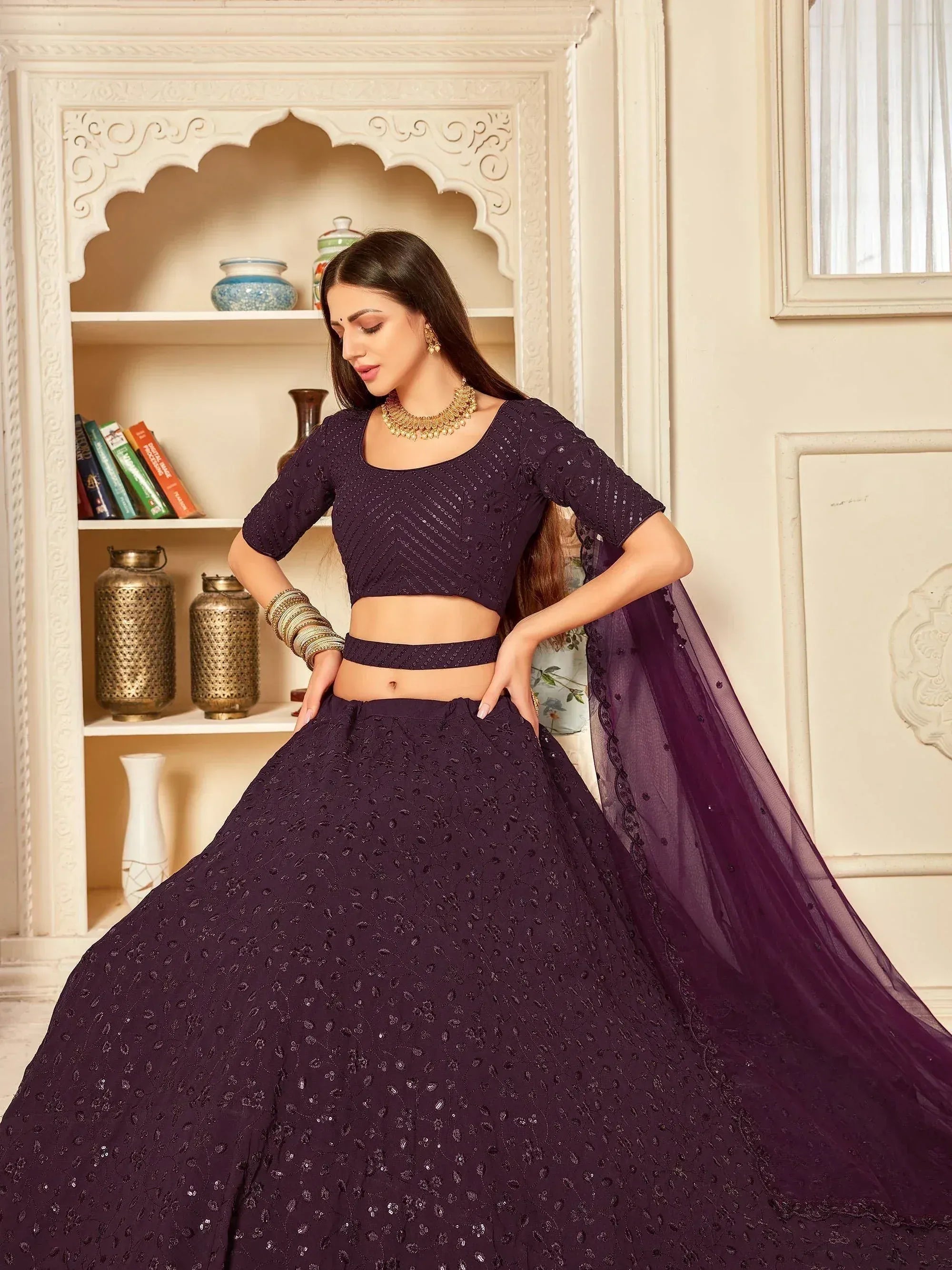 Elegant purple sequin lehenga choli with sheer dupatta, perfect for Indian ethnic wear events