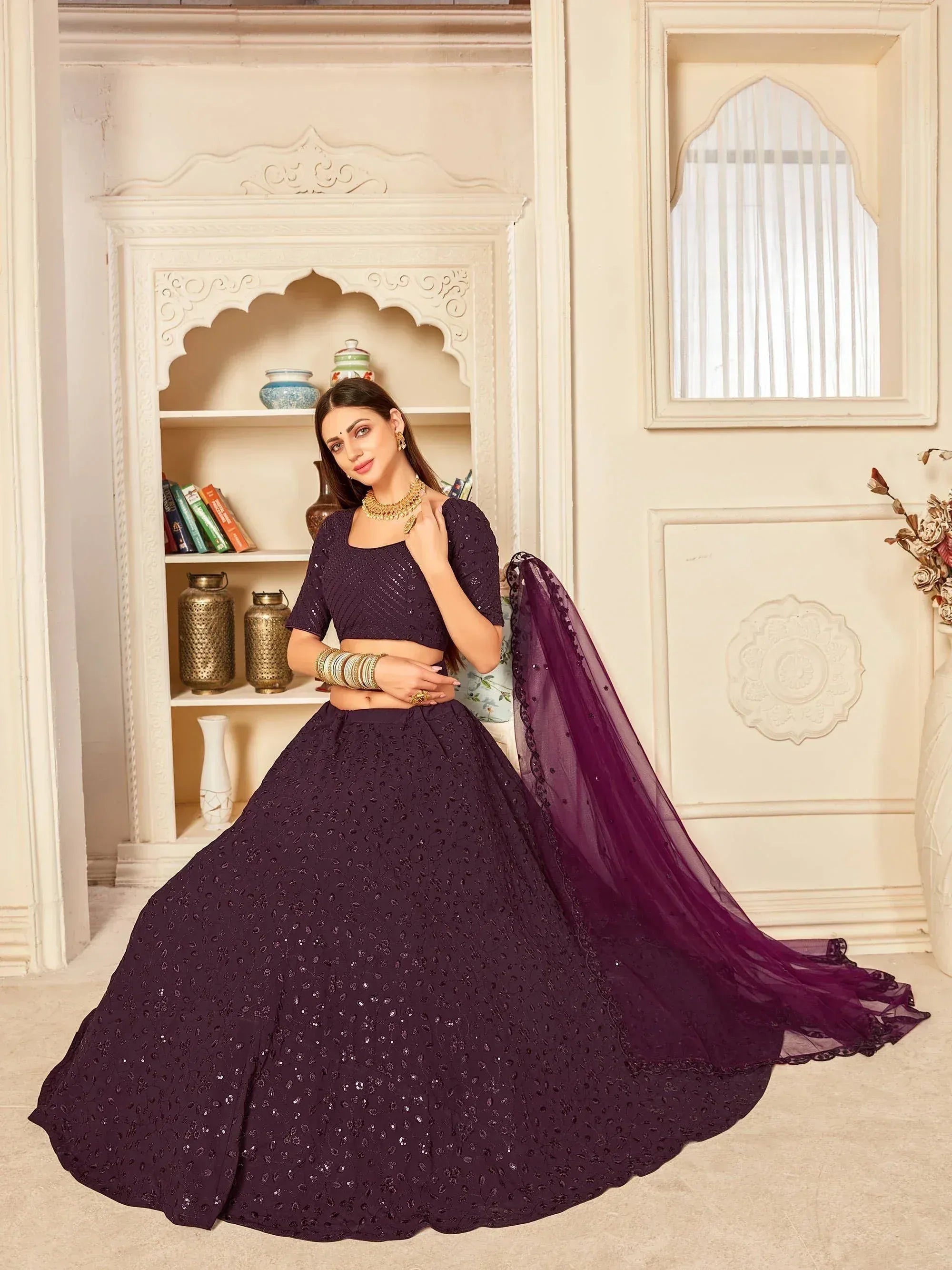 Elegant purple sequin lehenga choli with matching dupatta, perfect for Indian ethnic occasions and weddings.