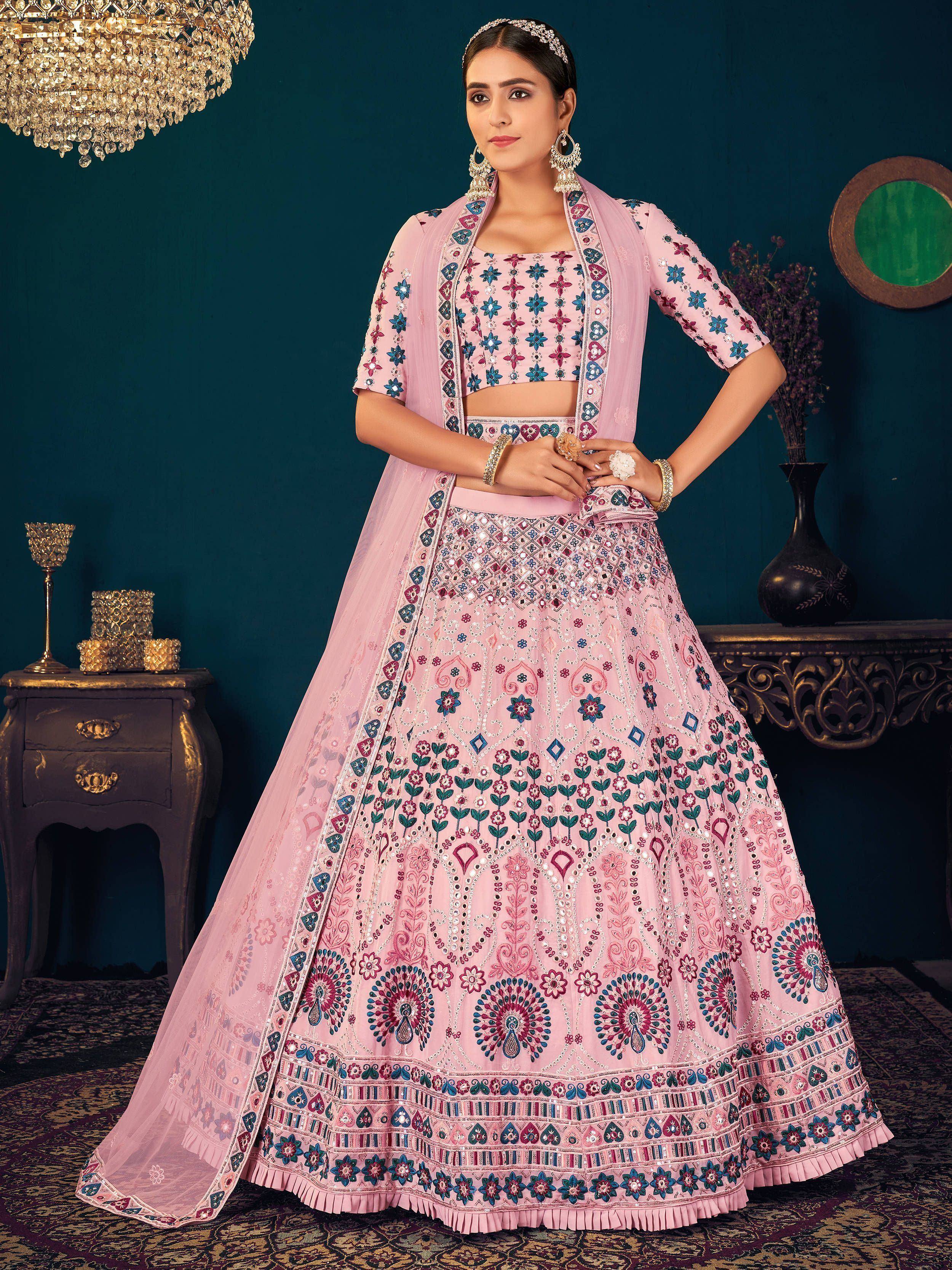 Pink floral embroidered lehenga choli with mirror work, perfect for Indian weddings and festive occasions