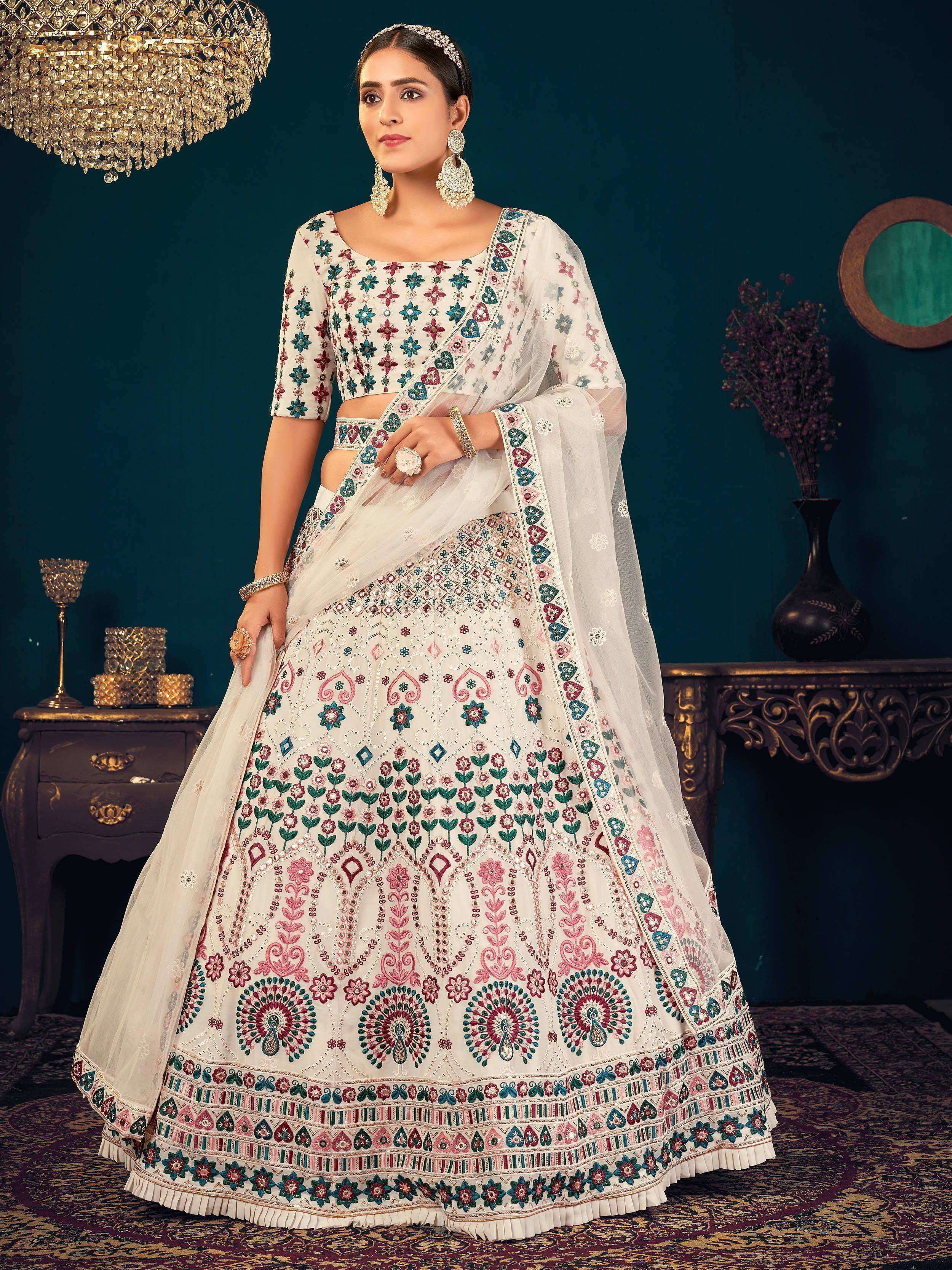 Elegant white lehenga choli with floral embroidery and peacock motifs for Indian ethnic wear