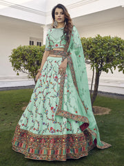Spectacular Pista Green Thread Embroidered Silk Wedding Wear Lehenga Choli
