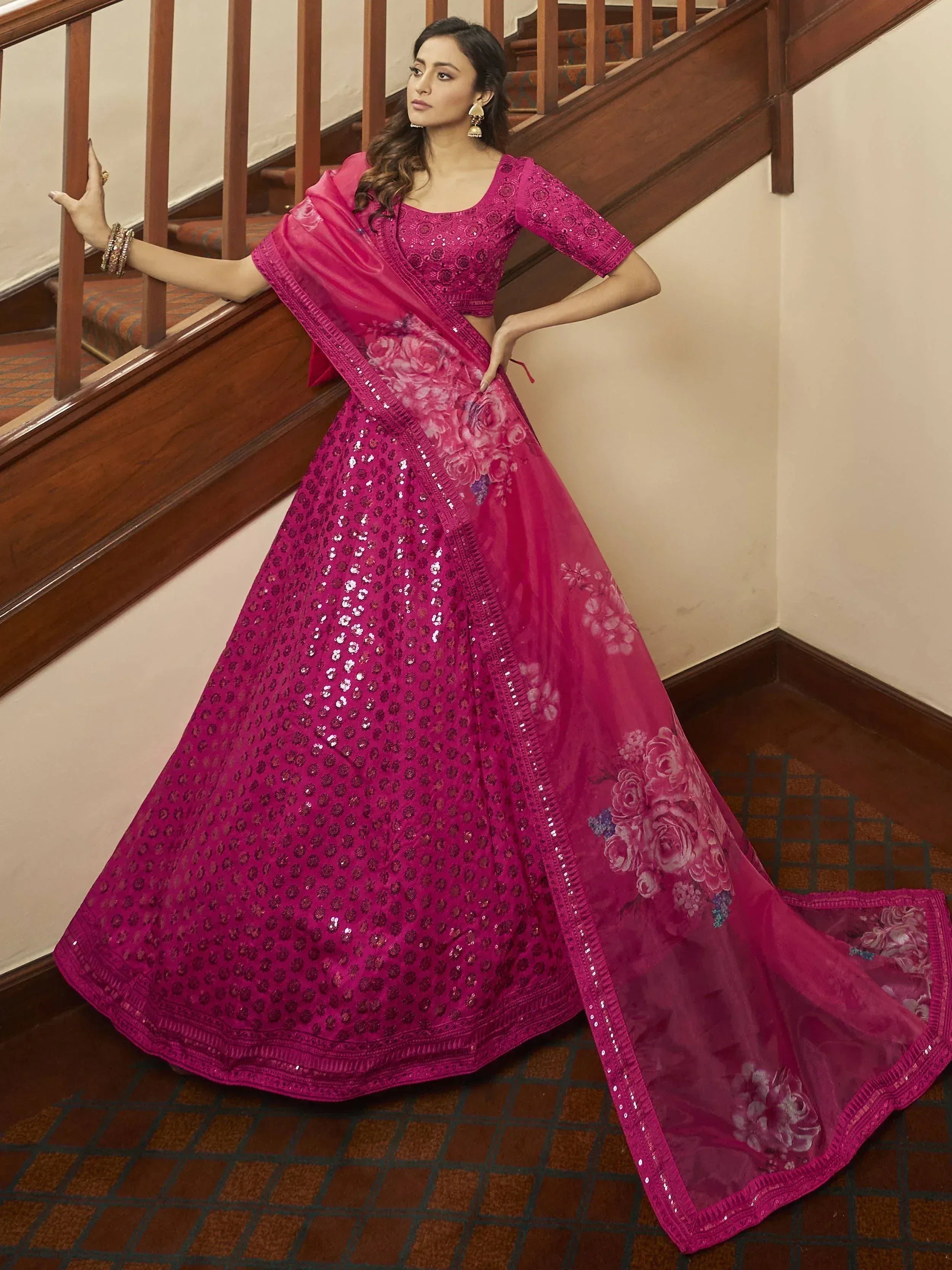 Fuchsia pink designer lehenga choli with floral print dupatta and sequin work, perfect for Indian ethnic occasions