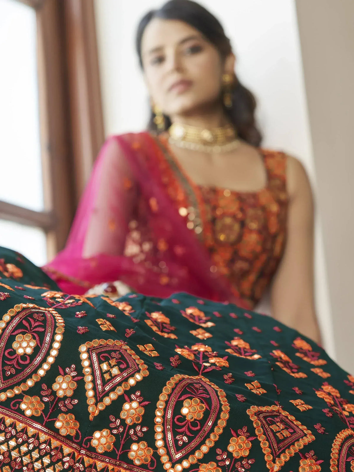 Elegant Indian ethnic wear with intricate embroidery and vibrant colors