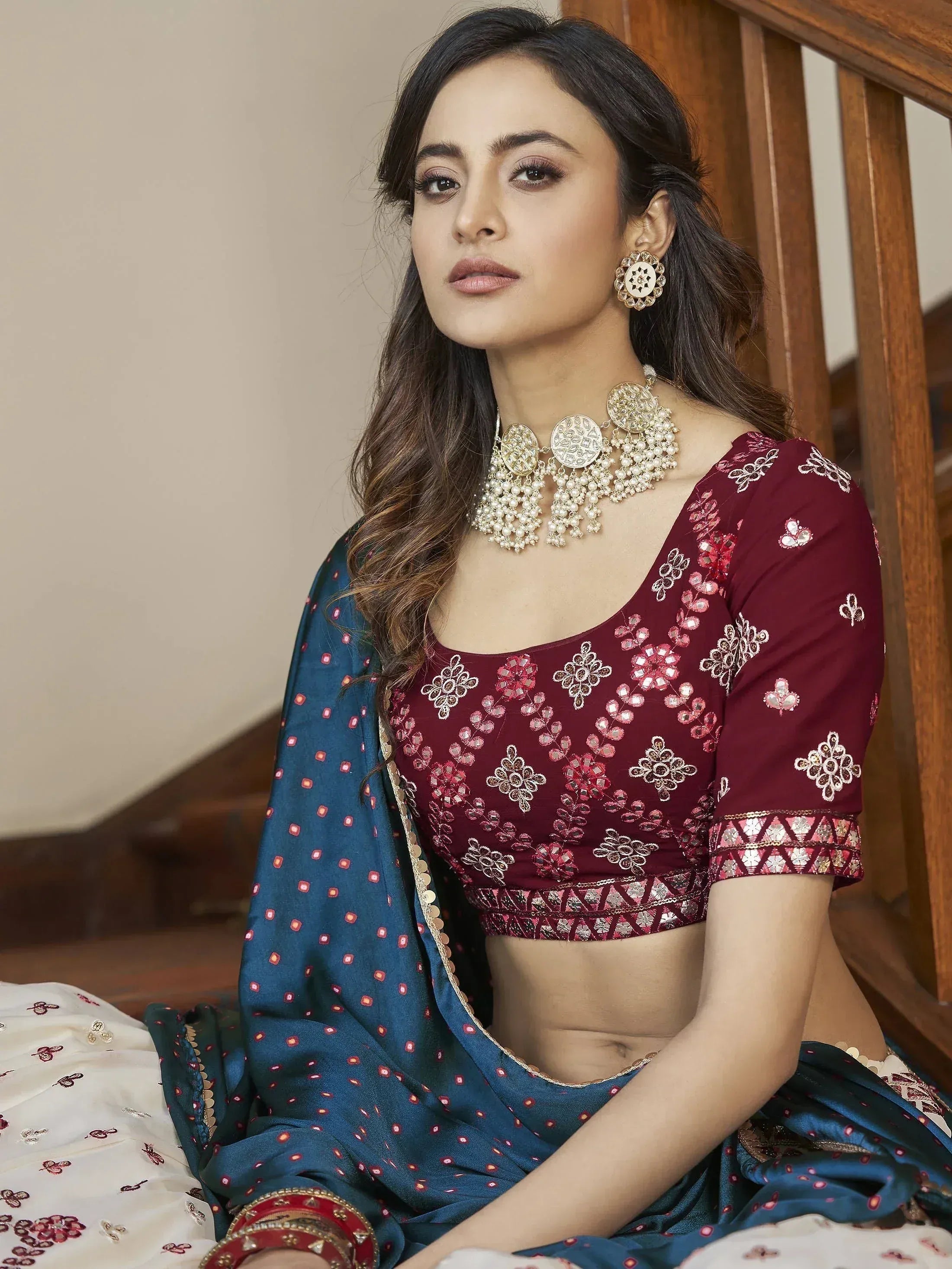Maroon embroidered blouse with blue saree, traditional Indian ethnic wear for women