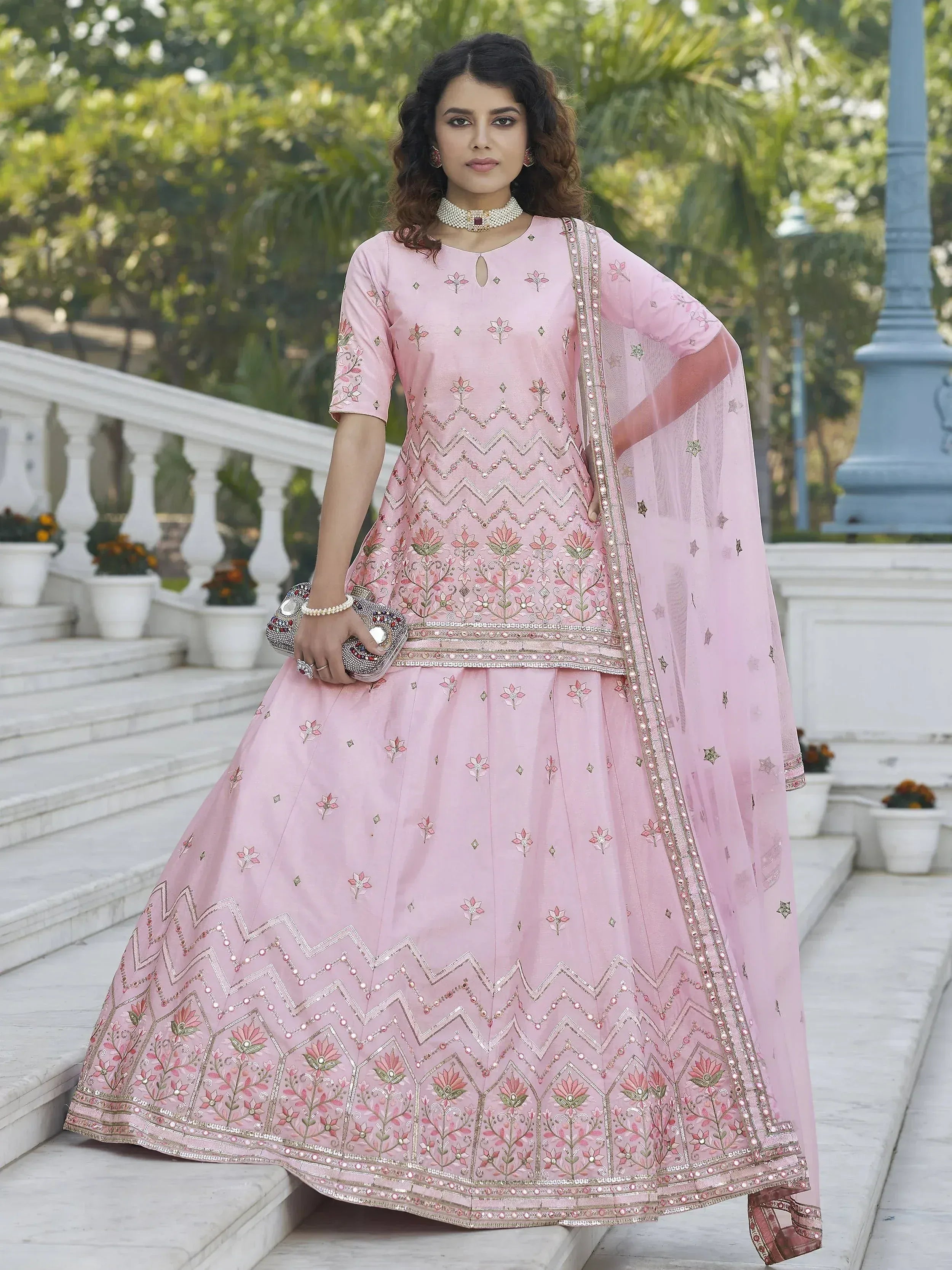 Pink embroidered lehenga choli with floral motifs and dupatta, perfect for Indian ethnic wear occasions