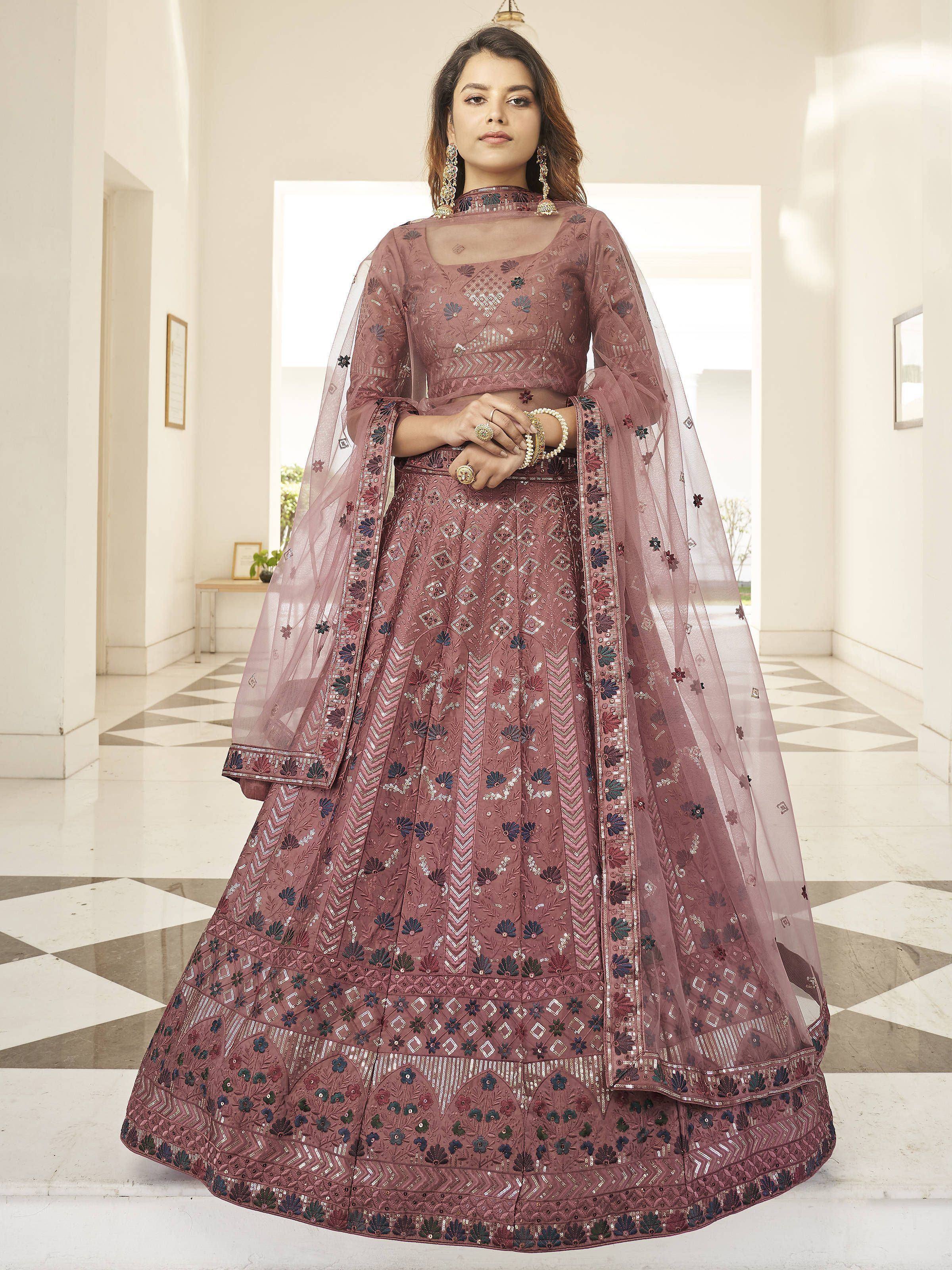 Elegant mauve designer lehenga choli with intricate embroidery and sheer dupatta for Indian ethnic wear