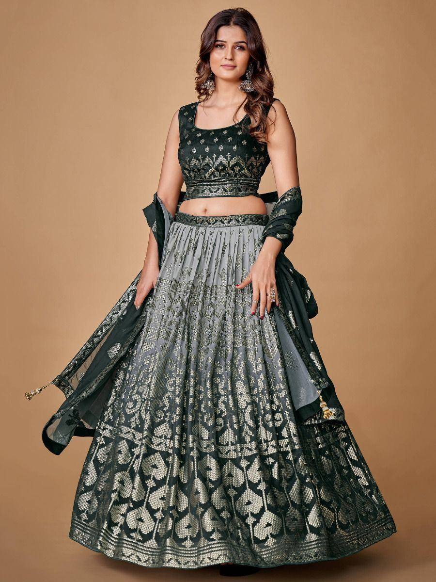 Elegant dark green and silver lehenga choli with intricate embroidery, perfect for Indian ethnic wear occasions.