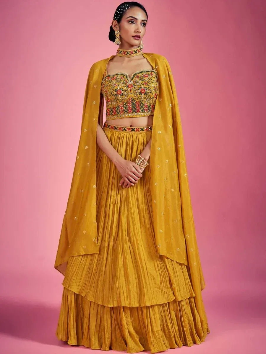 Yellow embroidered lehenga choli with cape, perfect for Indian ethnic wear and festive occasions