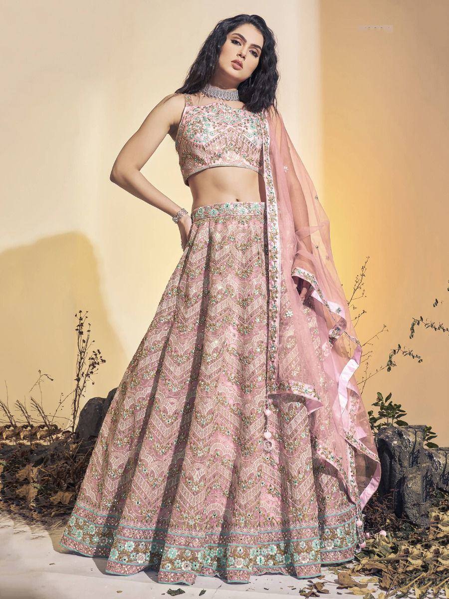 Pink embroidered lehenga choli with matching dupatta, perfect for Indian weddings and festive occasions