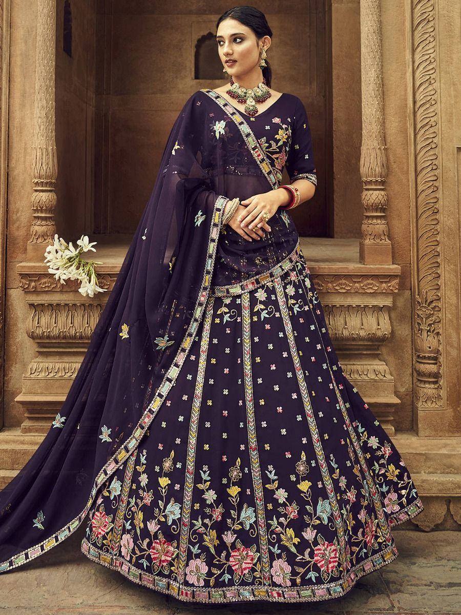 Elegant navy blue embroidered lehenga choli with floral motifs, perfect for Indian ethnic occasions