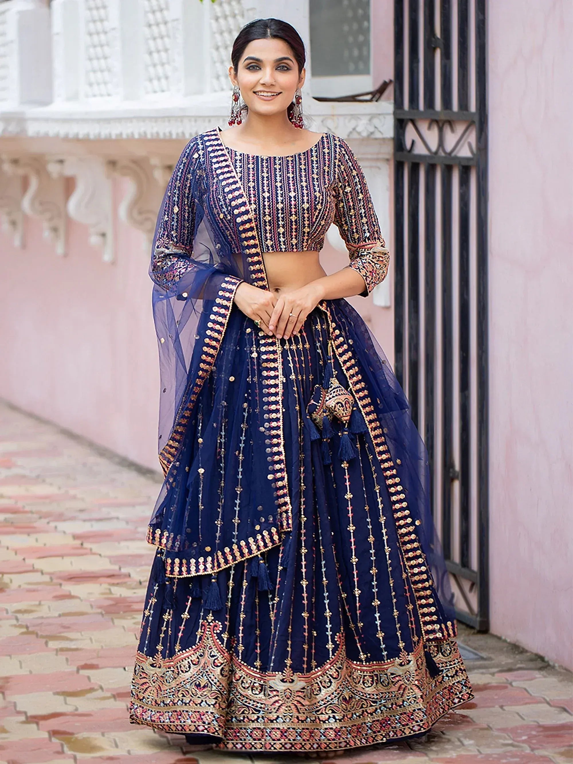 Navy blue embroidered lehenga choli with gold detailing, perfect for Indian ethnic wear occasions