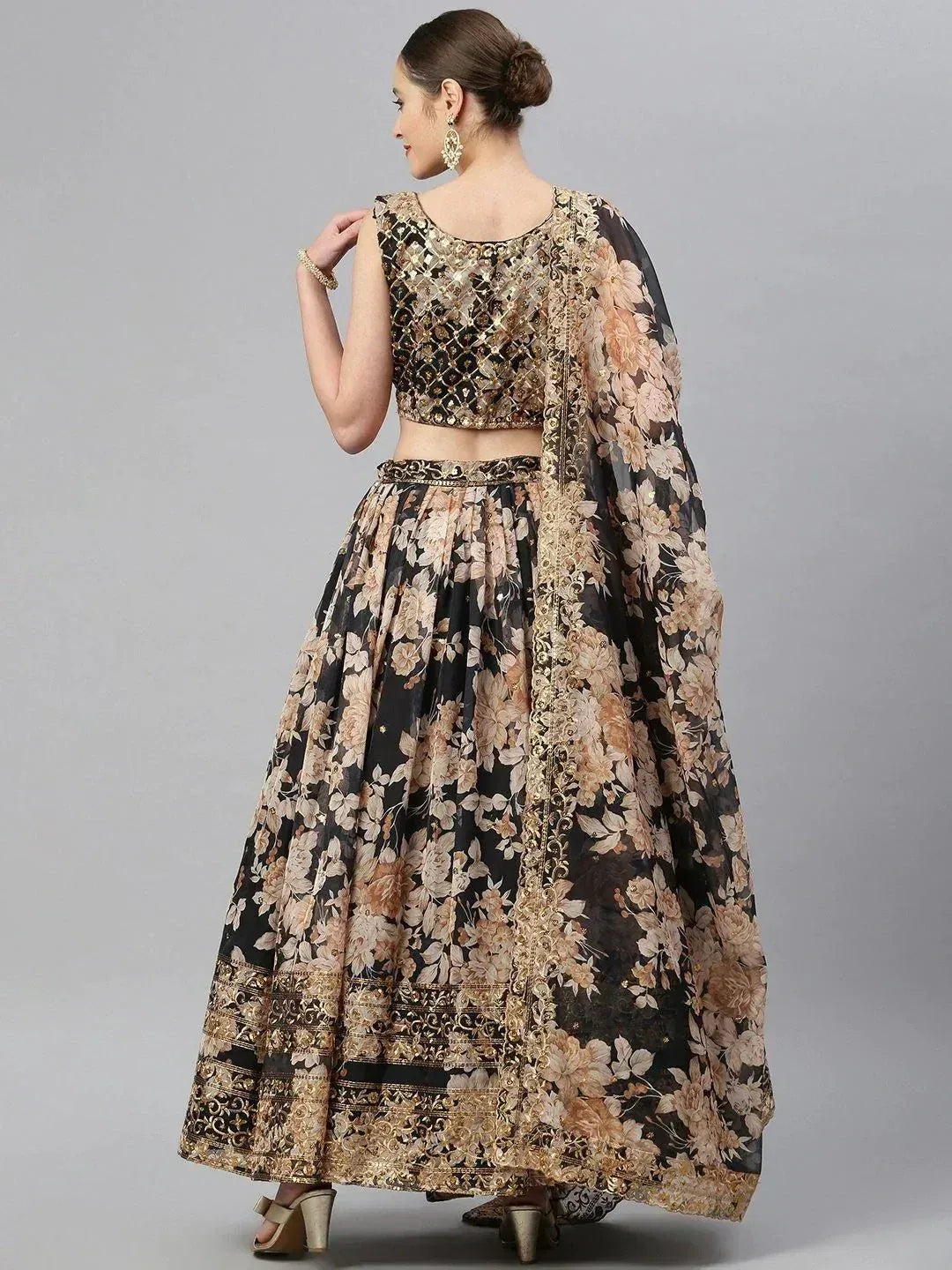 Black and gold floral lehenga choli with embroidered blouse and dupatta, ideal for Indian ethnic occasions