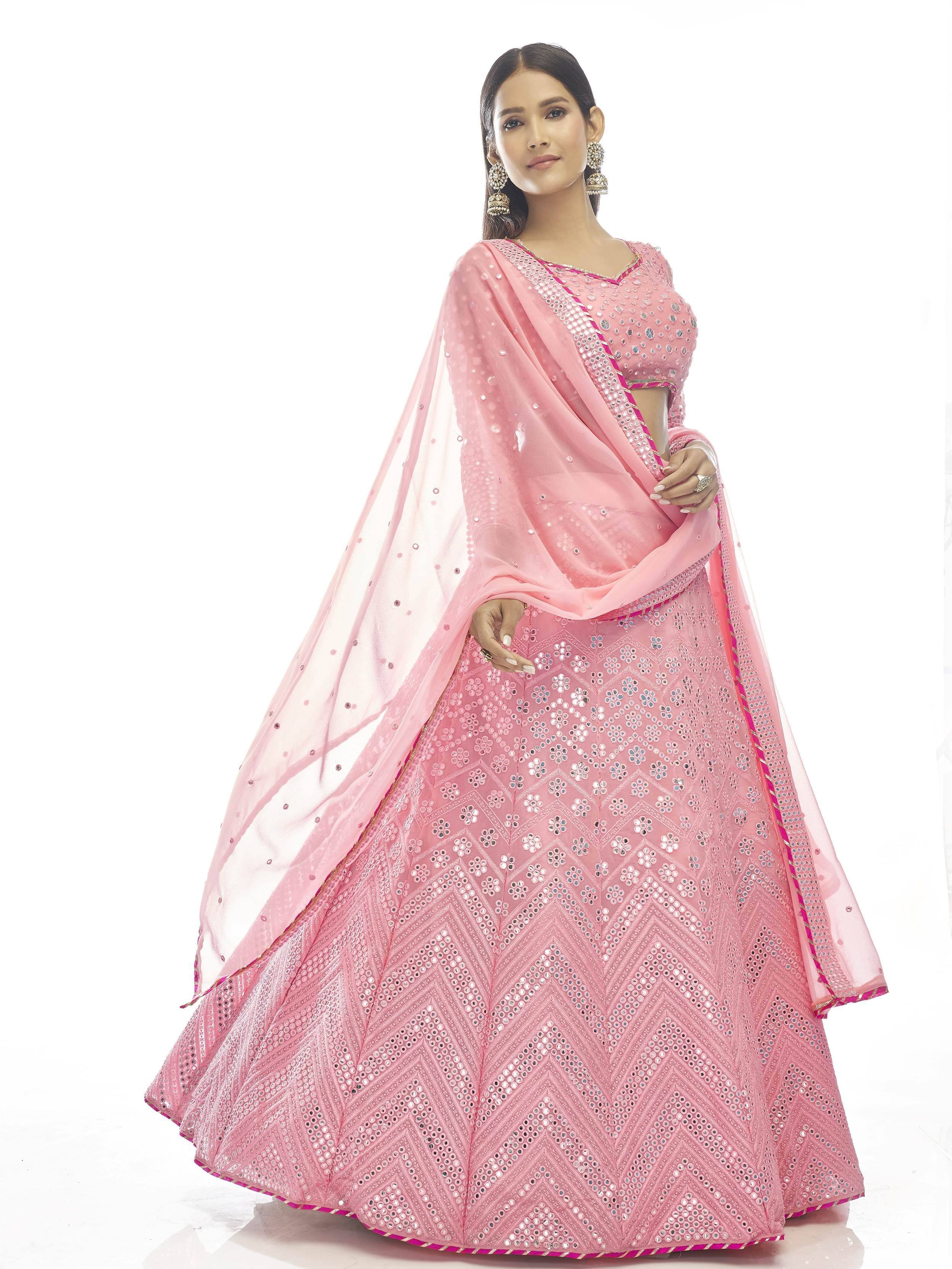 Pink designer lehenga choli with mirror work and dupatta, ethnic Indian wear for weddings