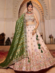 Adorning Peach Thread Embroidered Tissue Lehenga Choli With Dupatta