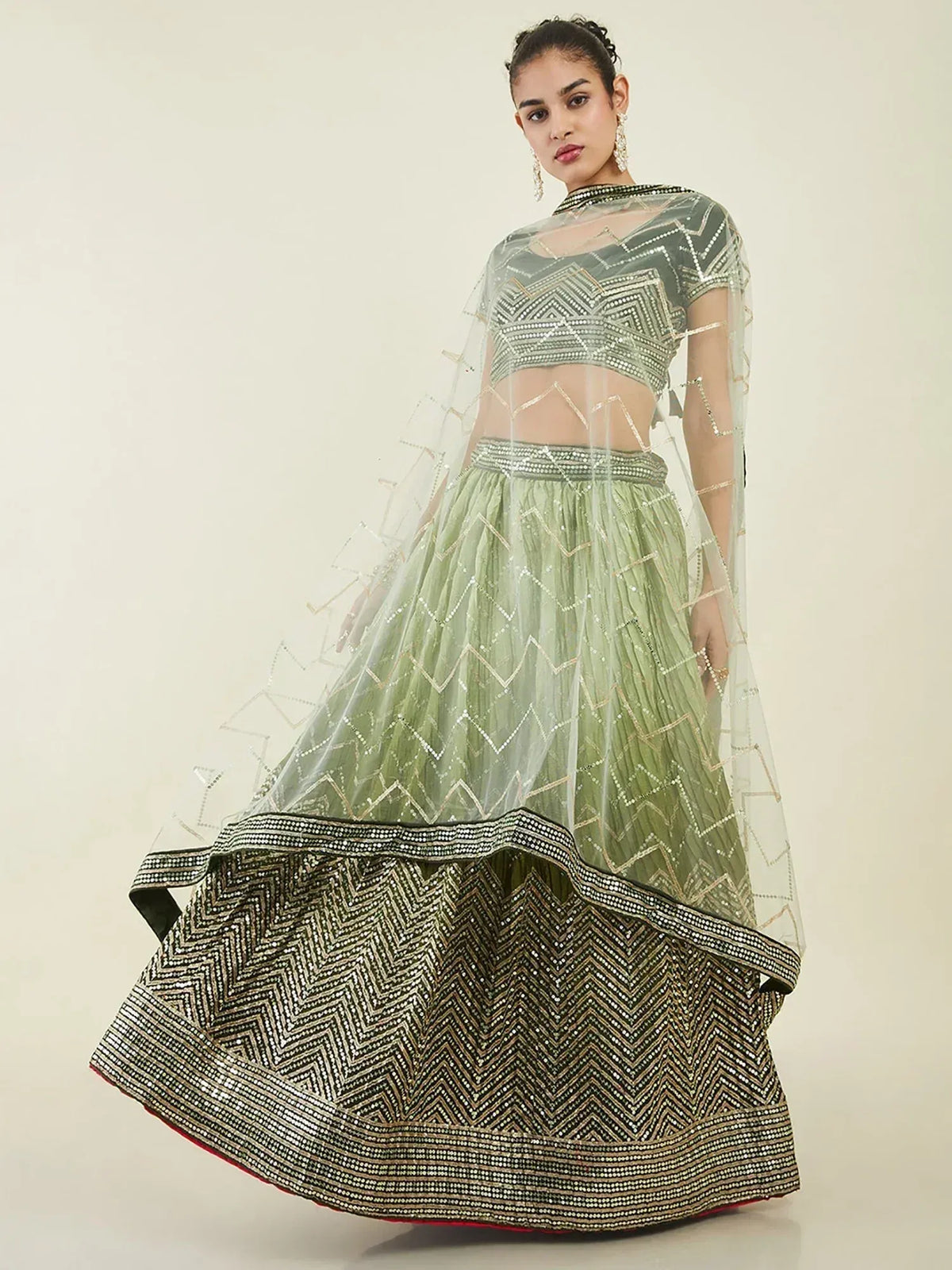 Mint green lehenga choli with geometric sequin embroidery and sheer dupatta, perfect for Indian ethnic wear events