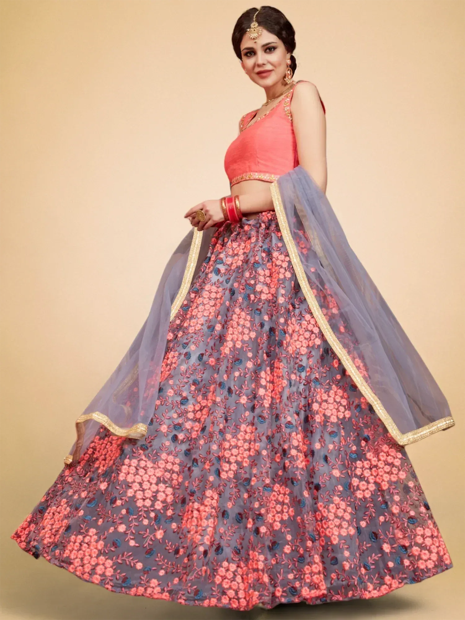 Pink and grey floral lehenga choli with gold trim, perfect for Indian ethnic wear and festive occasions