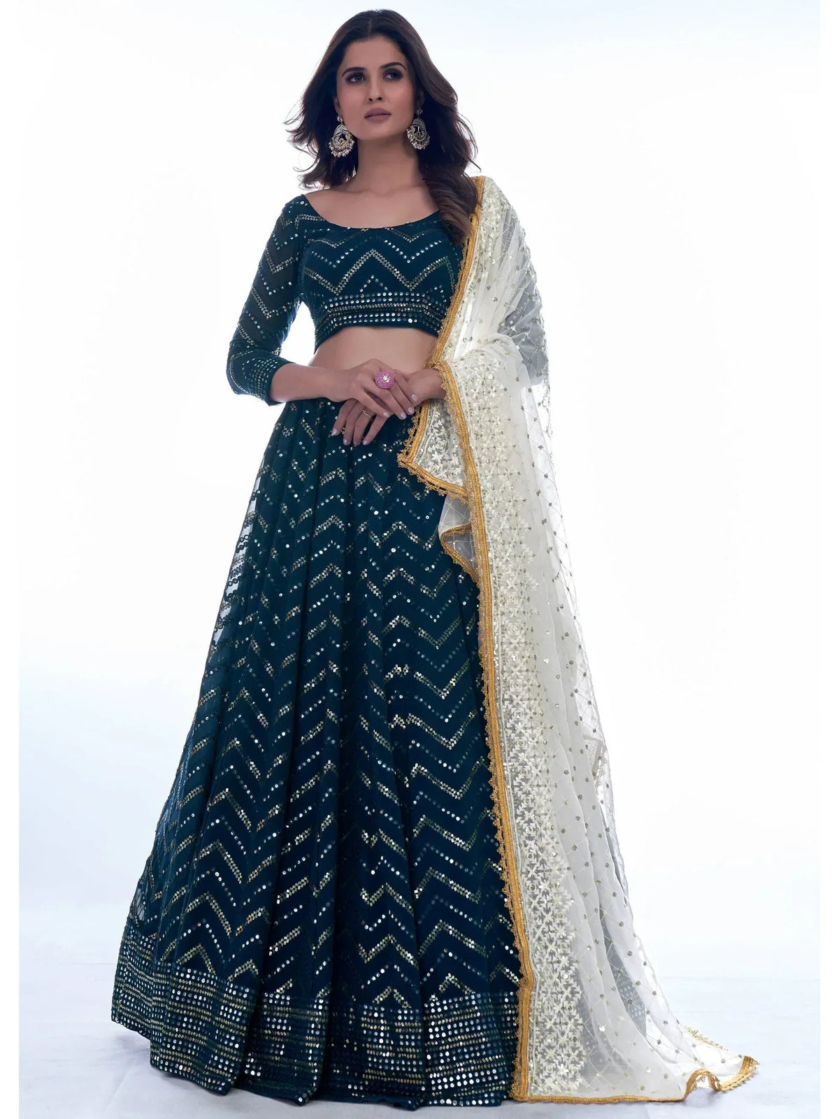 Emerald green sequin lehenga choli with gold zigzag pattern and white dupatta for Indian ethnic wear