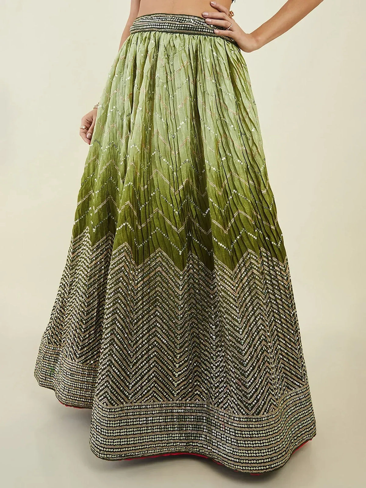 Olive green pleated lehenga skirt with zigzag sequin embroidery, perfect for Indian ethnic wear