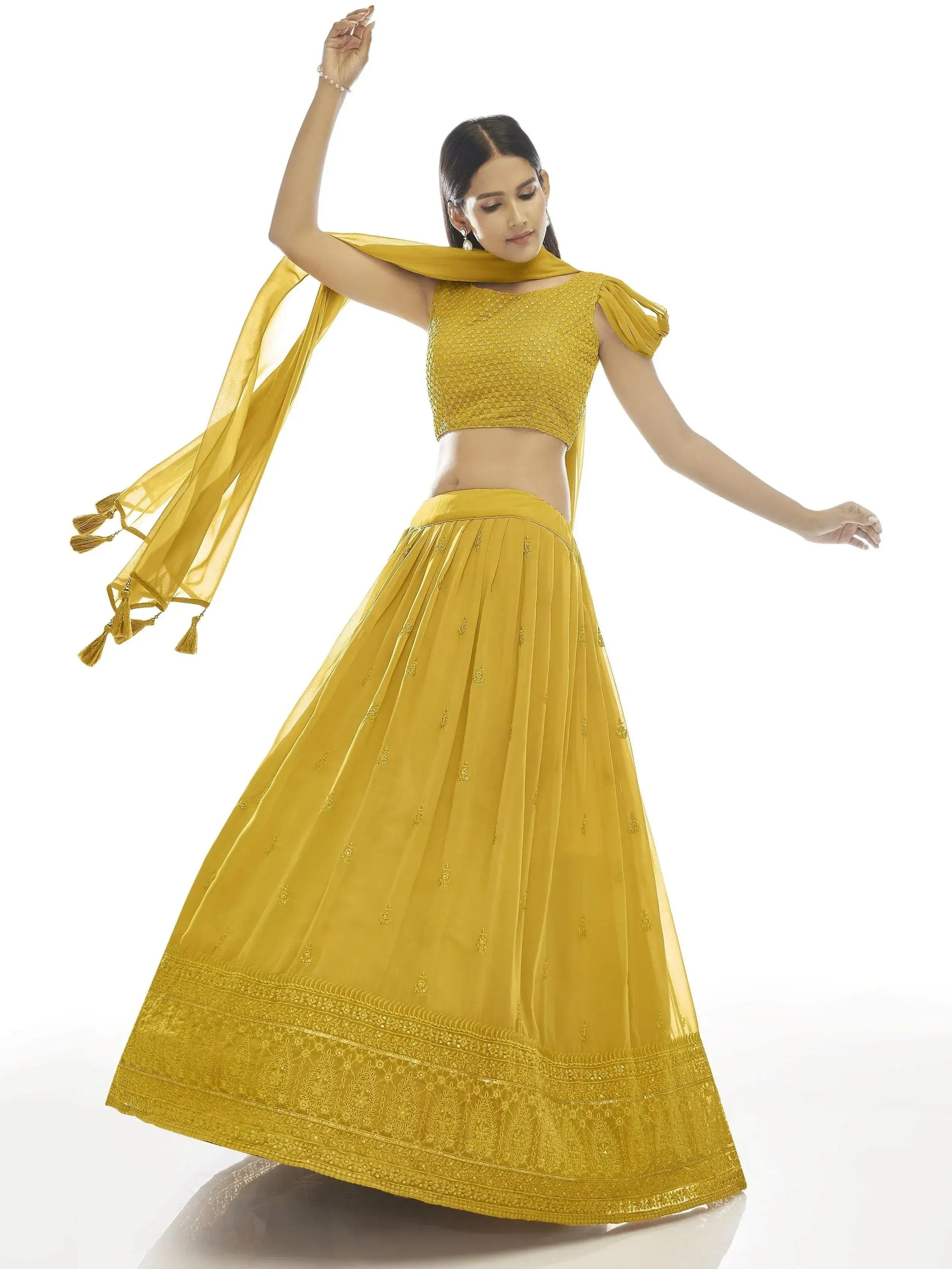 Yellow designer lehenga choli with embroidered skirt and dupatta, perfect for Indian ethnic wear occasions