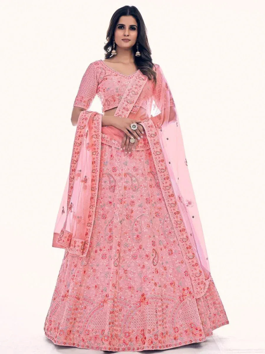 Pink embroidered lehenga choli with floral motifs and sheer dupatta, perfect for Indian ethnic occasions