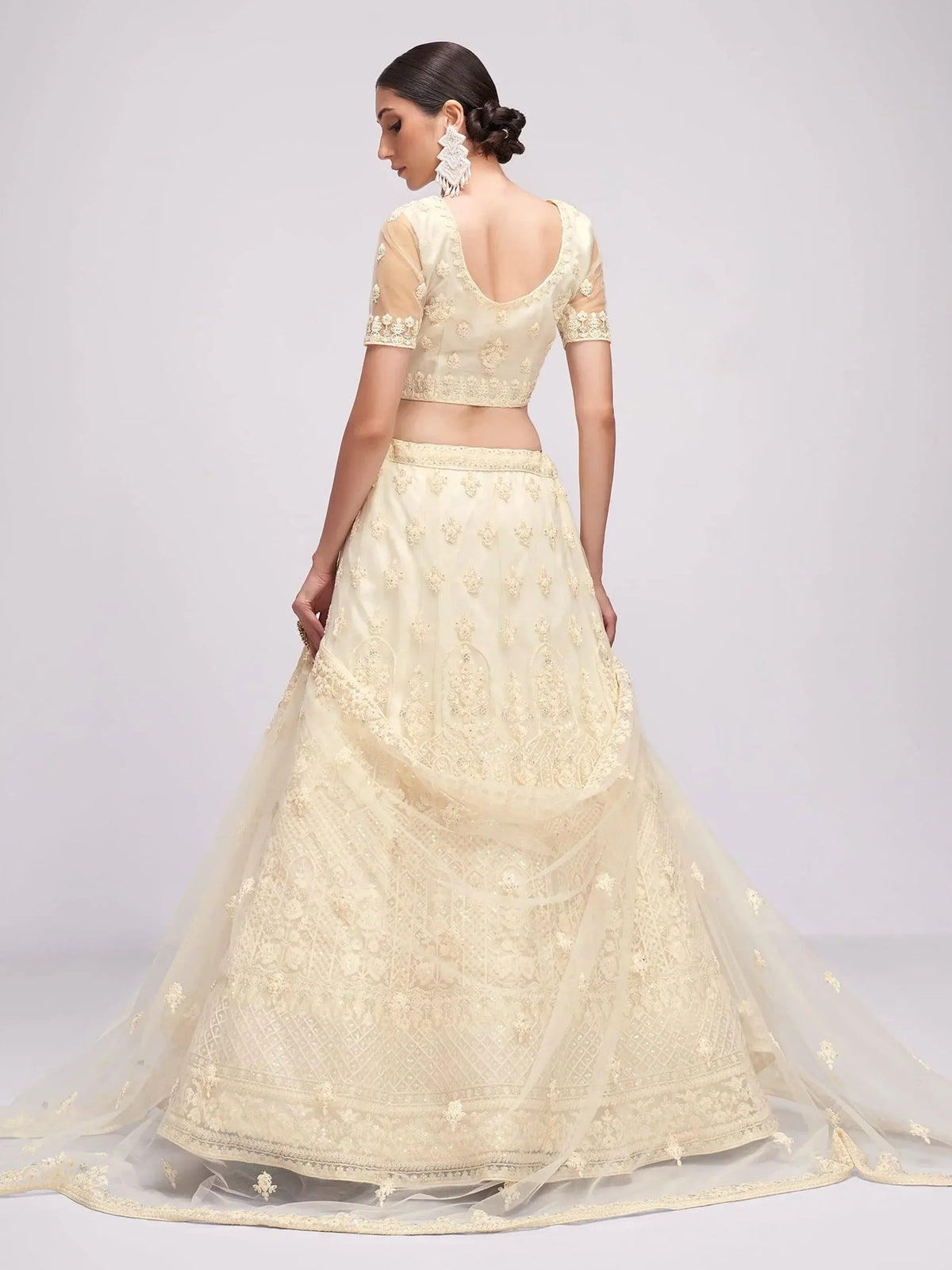 Cream embroidered lehenga choli with sheer dupatta, back view, Indian ethnic wear