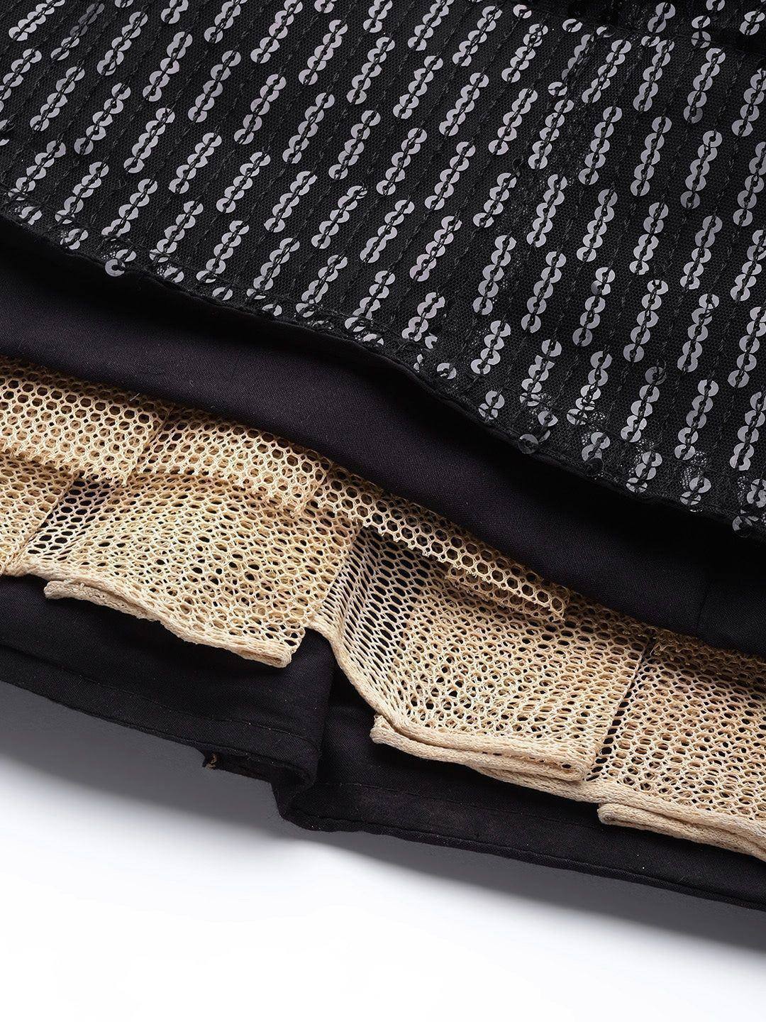 Black sequin and beige lace fabric layers for ethnic wear designs