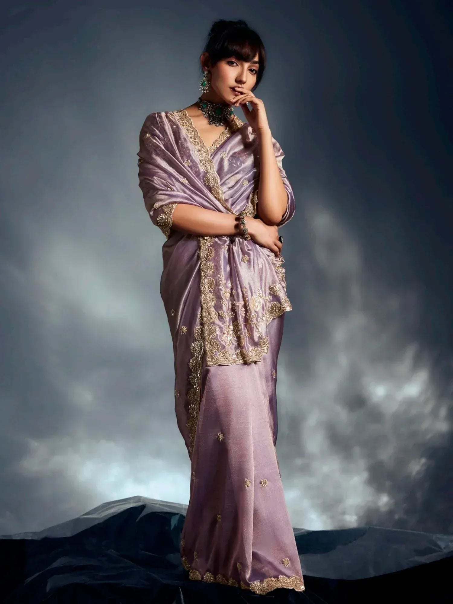 Elegant lavender saree with gold embroidery, perfect for Indian ethnic wear and designer occasions.