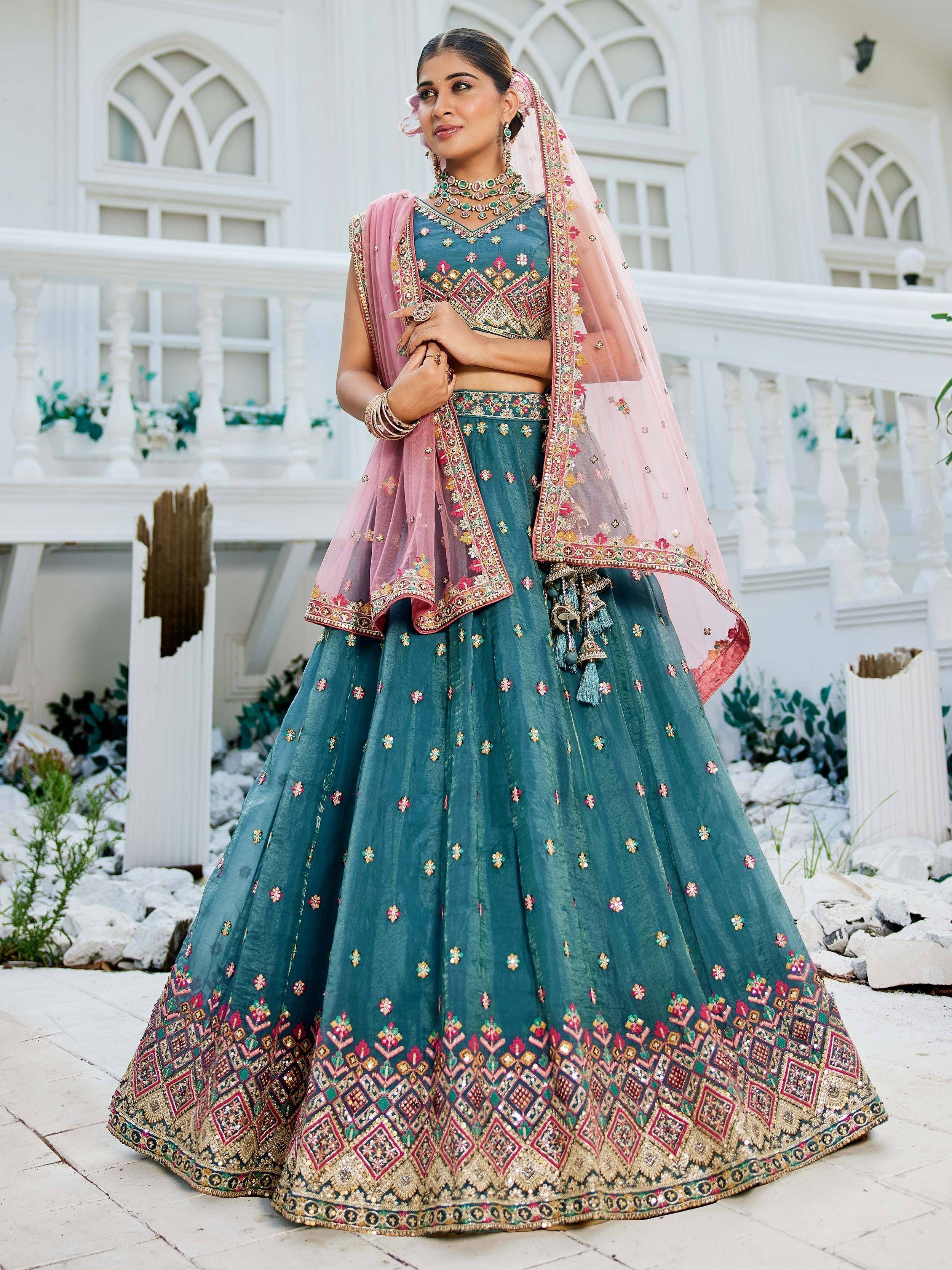 Teal embroidered lehenga choli with pink dupatta, Indian ethnic wear for weddings and festivals