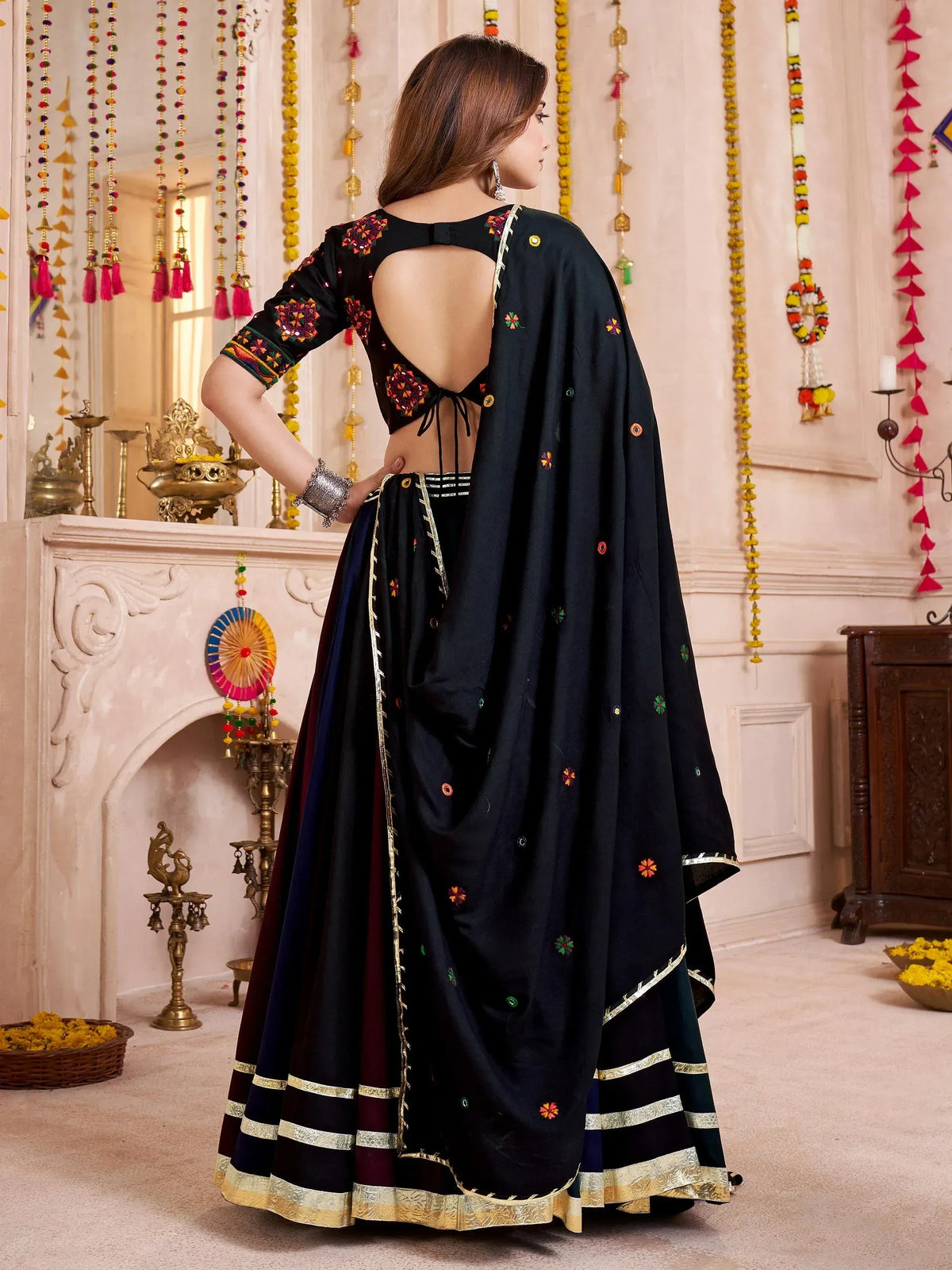 Black embroidered lehenga choli with open back and dupatta, Indian ethnic wear for festive occasions