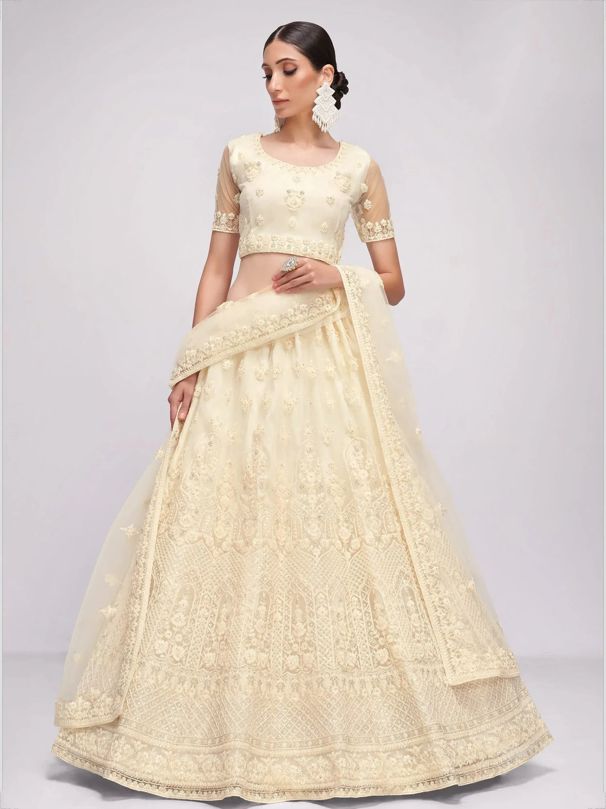 Cream embroidered lehenga choli with sheer sleeves and dupatta, Indian ethnic wear for weddings